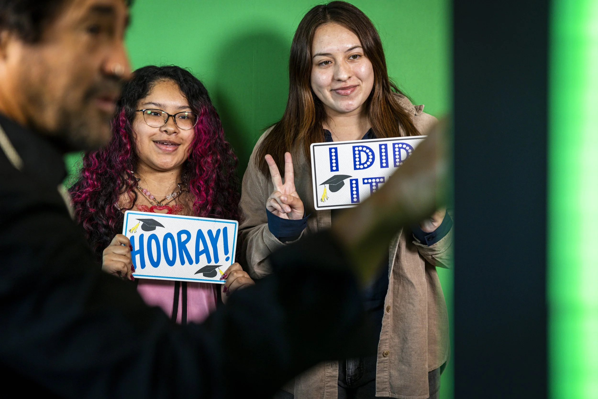  New Santa Monica College (SMC) graduates Christie Rojas-Sapon (L) and Keily Acuna-Tomas (R) pose in the photo booth during the Student Equity Center celebration for LGBTQIA2S+ graduates from the Class of 2026 on Wednesday, May 27, 2026, in the Stude