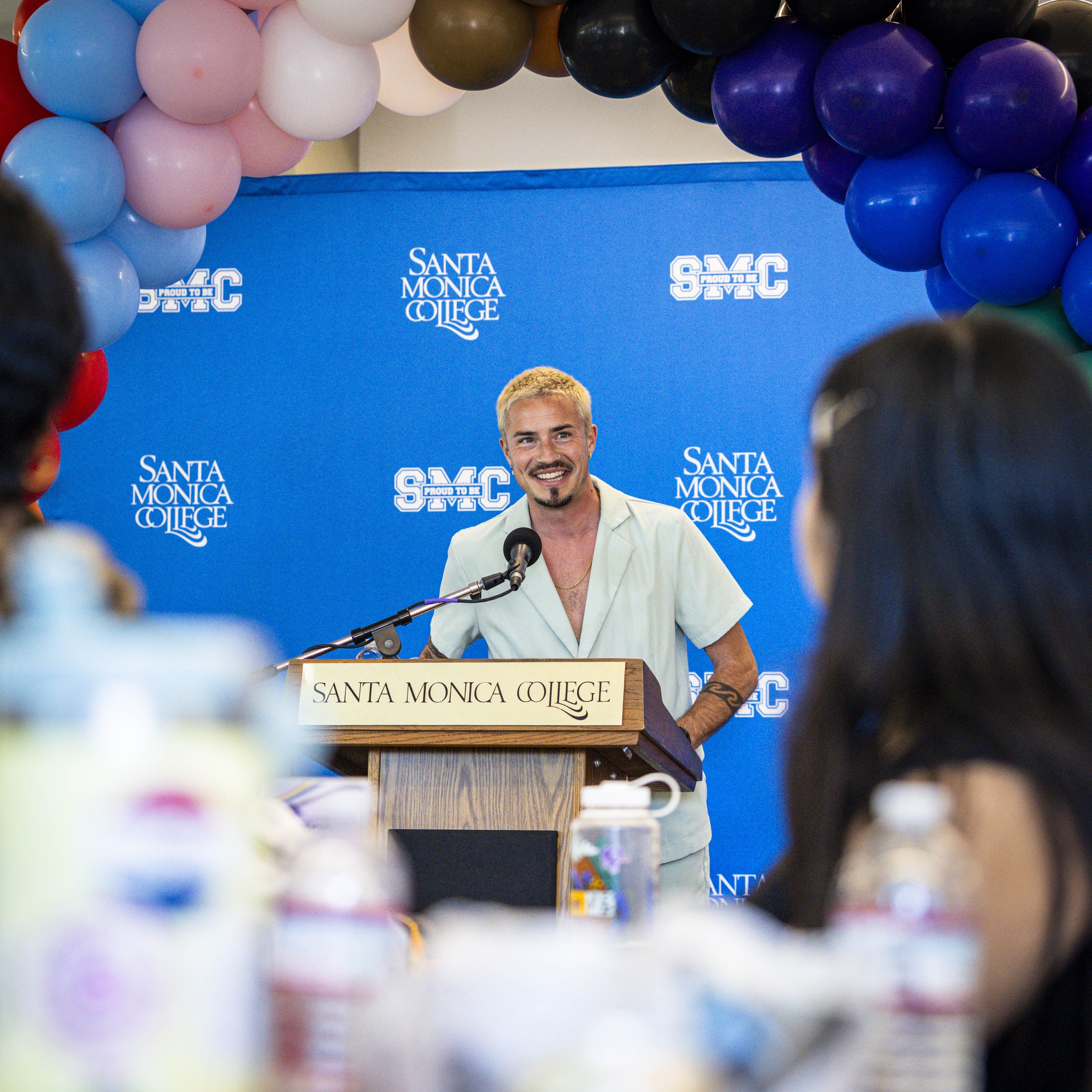  Guest speaker Cal Calamia, a marathoner and inclusivity activist, speaks during the Student Equity Center celebration for LGBTQIA2S+ graduates from the Class of 2026 on Wednesday, May 27, 2026, in the Student Services Center’s Faculty Room at Santa 
