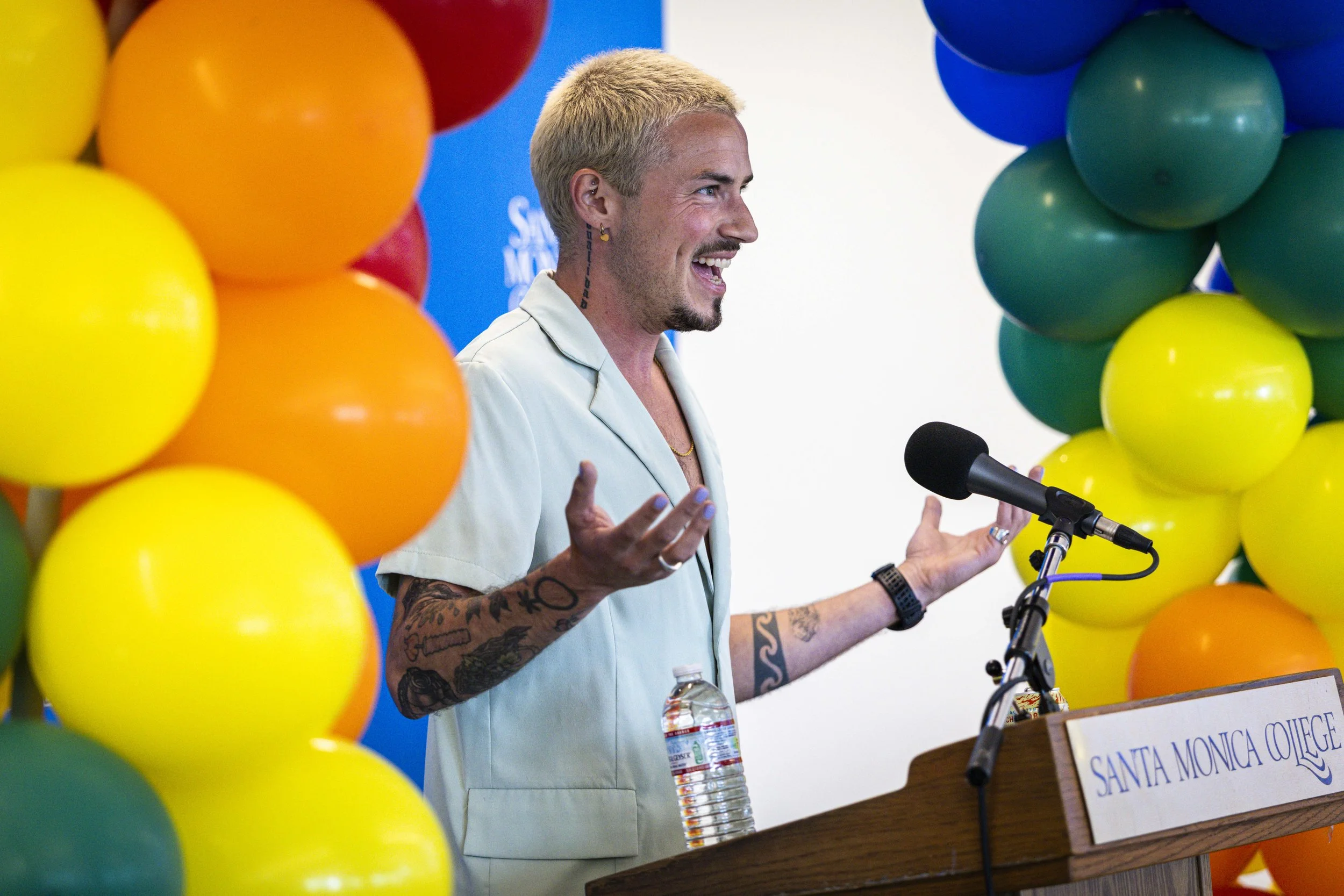  Guest speaker Cal Calamia, a marathoner and inclusivity activist, speaks during the Student Equity Center celebration for LGBTQIA2S+ graduates from the Class of 2026 on Wednesday, May 27, 2026, in the Student Services Center’s Faculty Room at Santa 