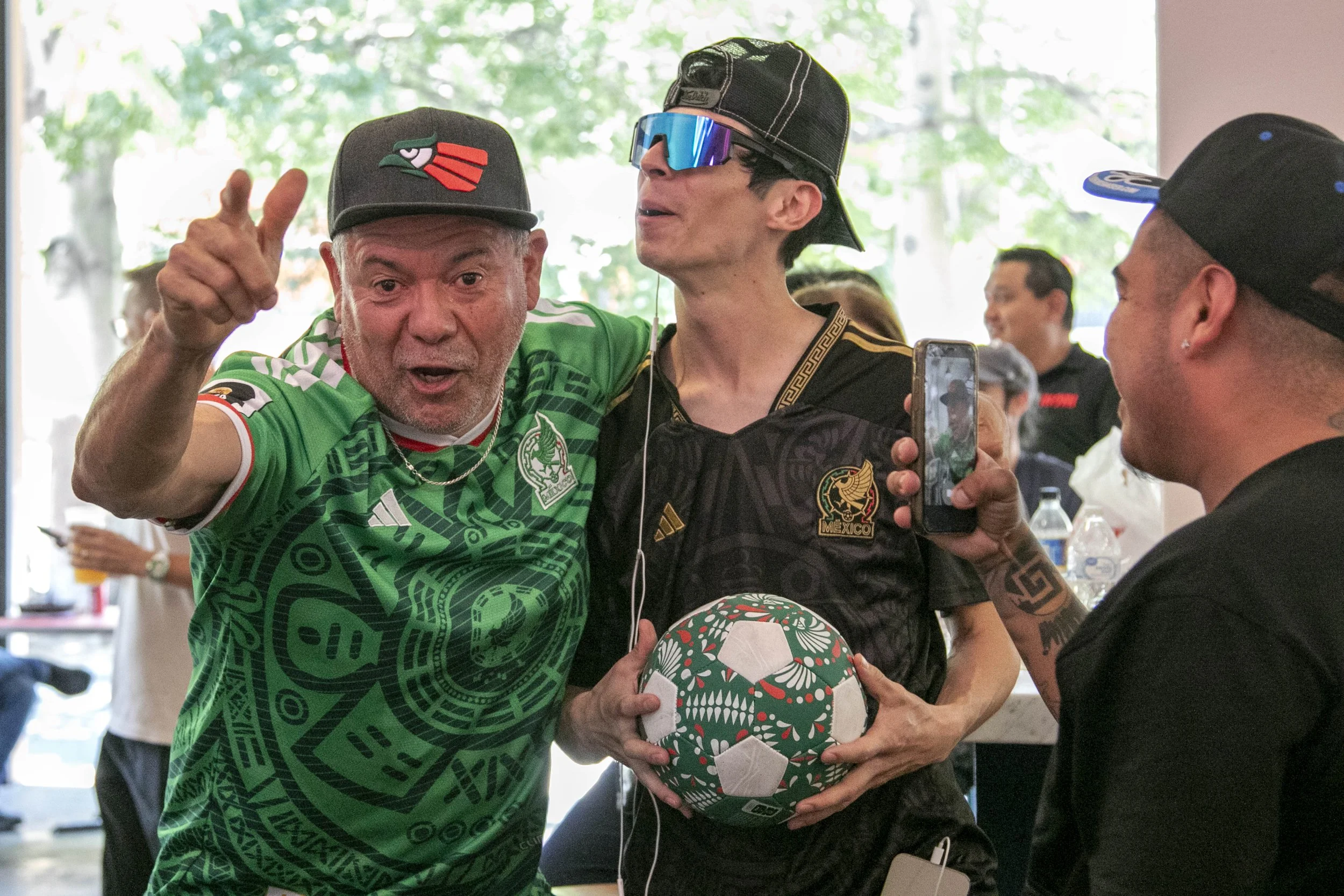  Mexico Soccer Fans cheering as Mexico striker Raul Jimenez scores the second goal for Mexico during the inaugural match of the 2026 Fédération Internationale de Football Association (FIFA) World Cup at the Grand Central Market, Downtown Los Angeles,