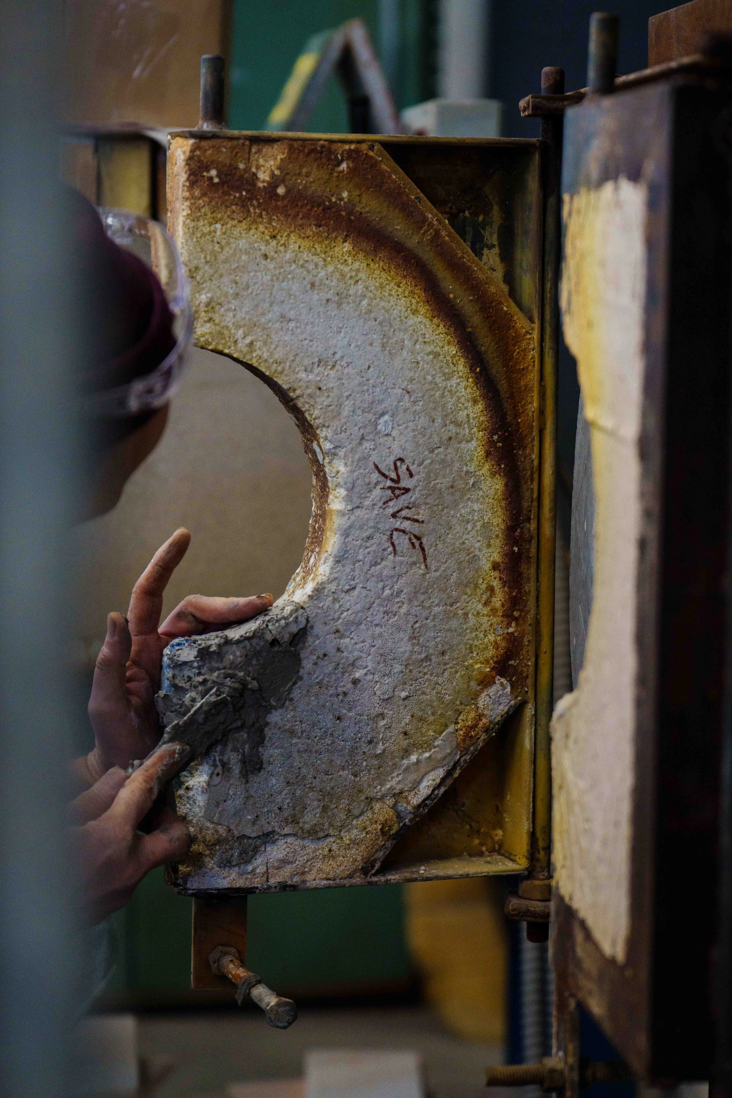  Santa Monica College Art Department laboratory technician Darren Frale patches door of a glory hole in preparation for the spring semester, Jan. 26, 2026 inside the glass studio at SMC Arts Complex in Santa Monica, Calif. Over the winter, art depart