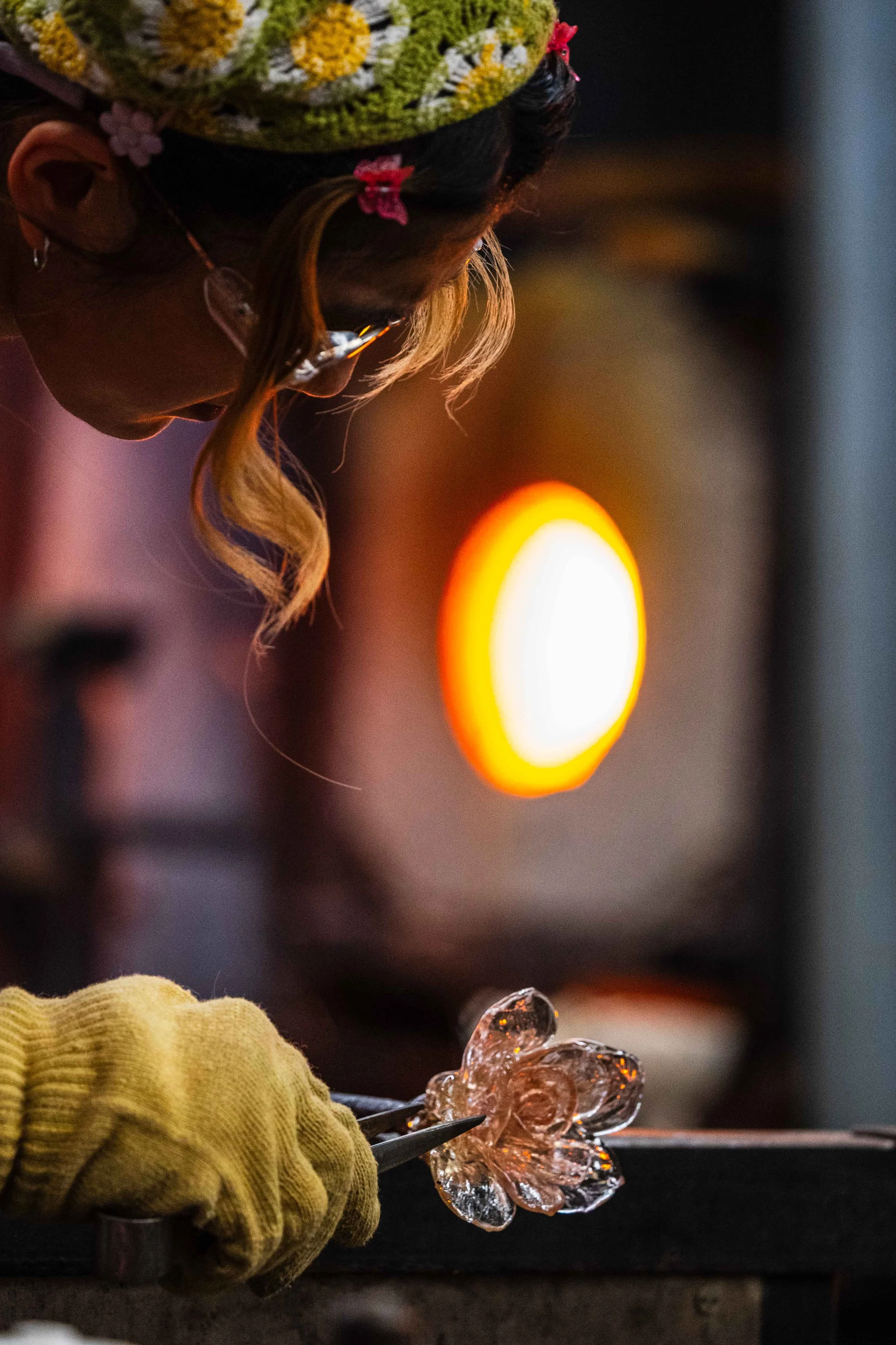  Santa Monica College (SMC) glass art student Haneul Park shapes flower petals using a jack in the hot shop in the SMC arts complex in Santa Monica, Calif., Friday, June 5, 2026. (Elizabeth Bacher | The Corsair) 