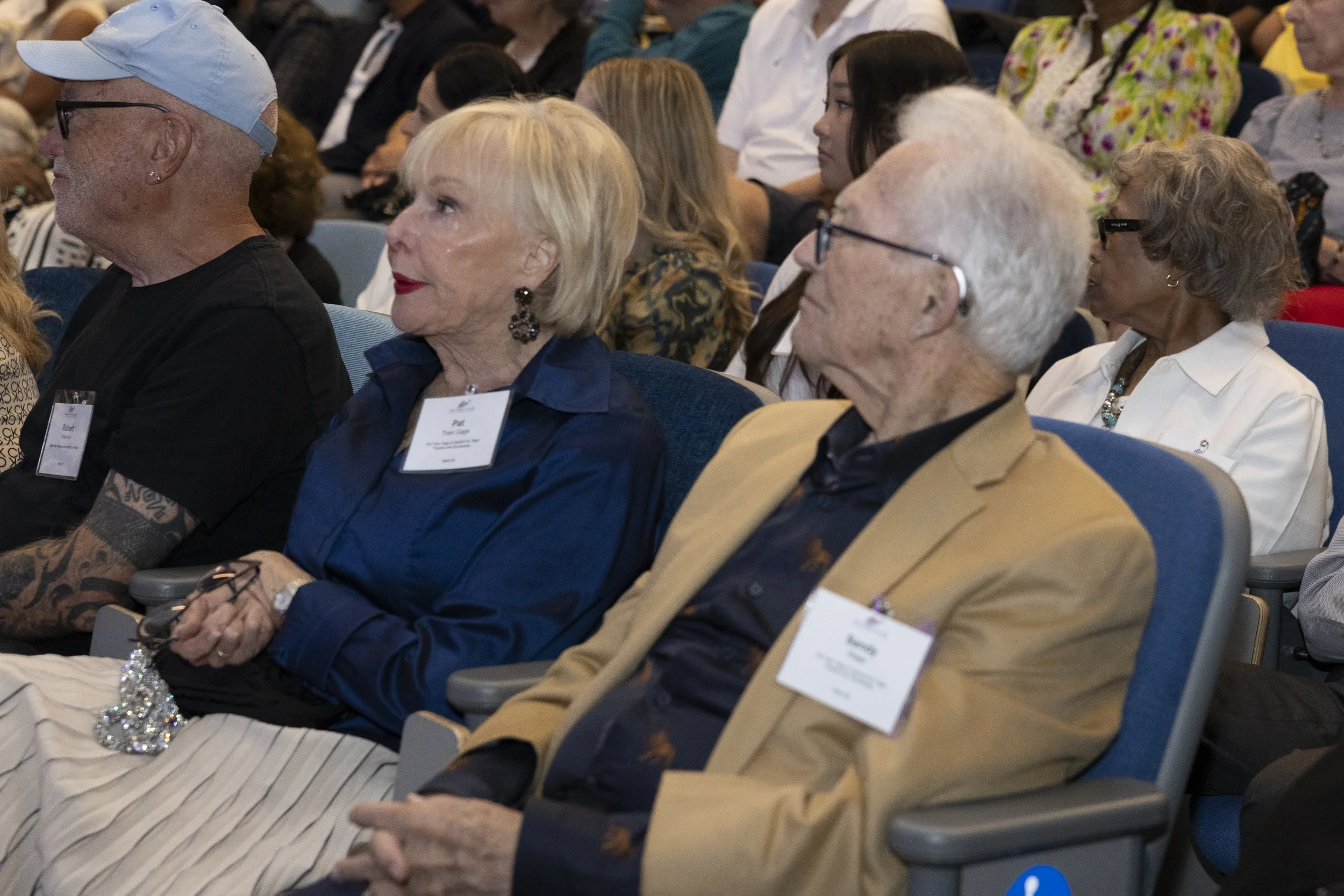  Santa Monica College donor Patricia Gage (L) cries next to her husband, Sandy Gage, during a speech at the college’s scholarship and donor recognition event inside the Student Services Center in Santa Monica, Calif., on Friday, June 12, 2026. (Kayje