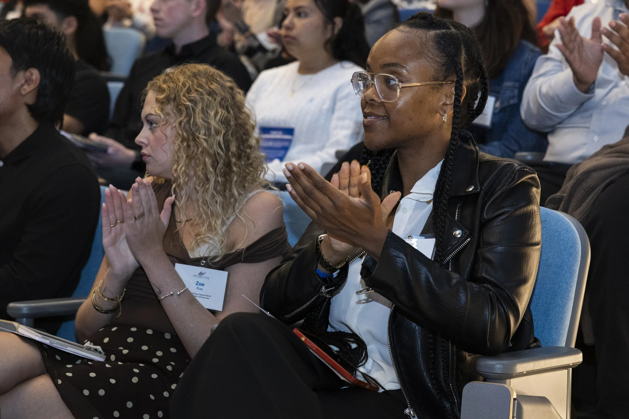  Santa Monica College student Zoe Roe (R) claps during the college’s scholarship and donor recognition event inside the Student Services Center in Santa Monica, Calif., on Friday, June 12, 2026. (Kayjel J. Mairena | The Corsair)  