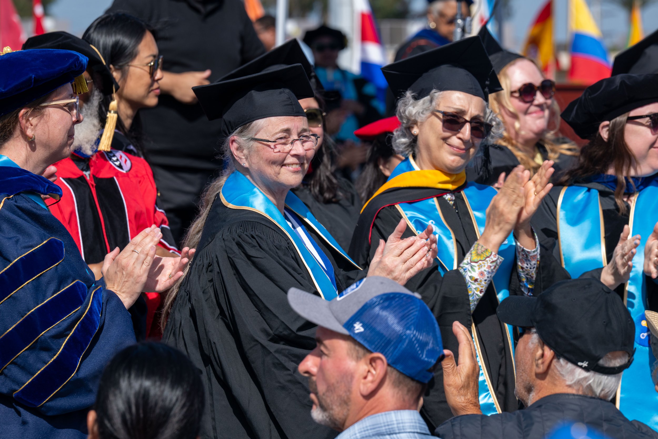  Instructors applauding the graduates at the Santa Monica College (SMC) 2026 Graduation Ceremony at the Corsair Stadium, Santa Monica, Calif., on Tuesday, June 16, 2026. (Tom Rosholt | The Corsair) 