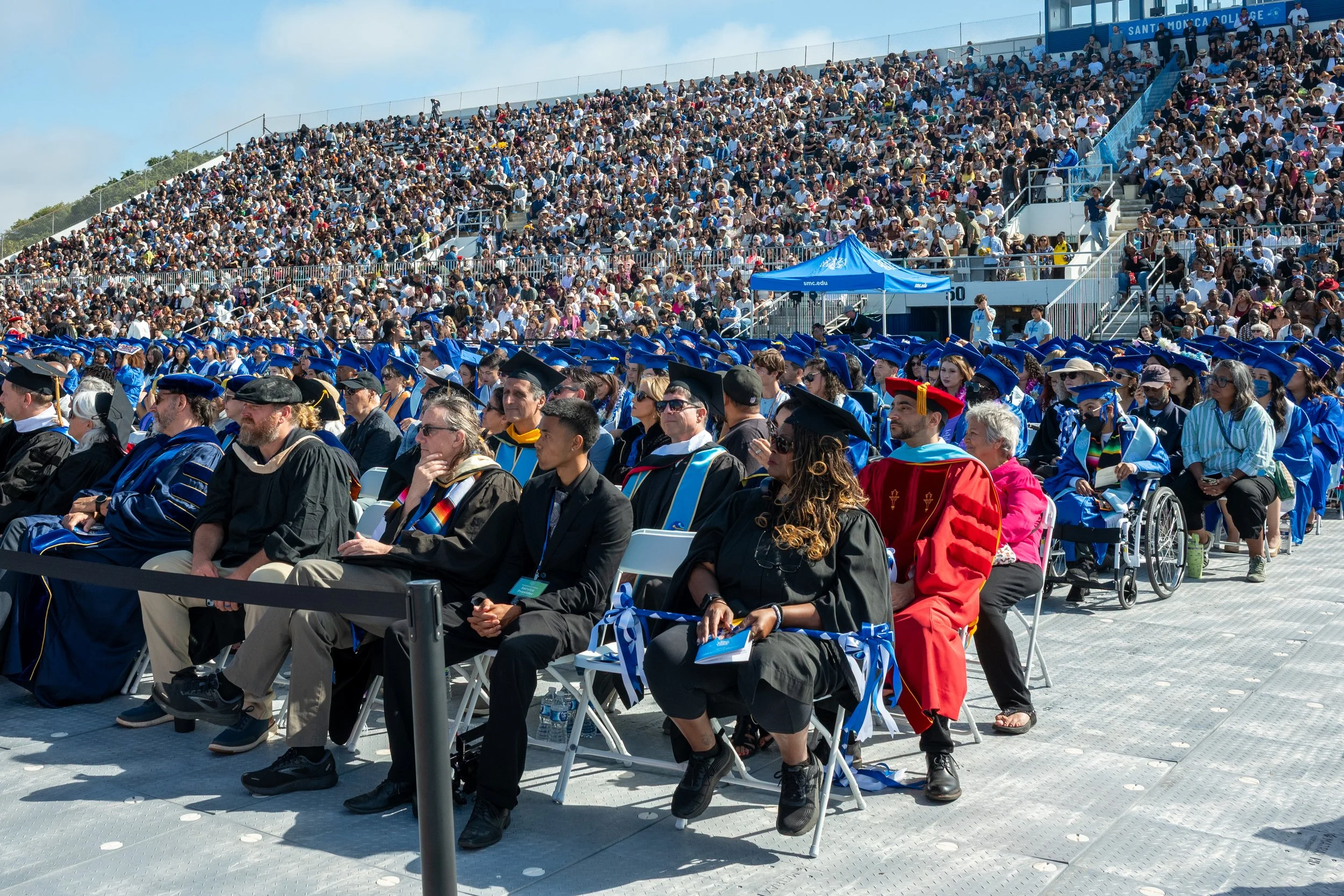  Graduates and audeince at the Santa Monica College (SMC) 2026 Graduation Ceremony at the Corsair Stadium, Santa Monica, Calif., on Tuesday, June 16, 2026. (Tom Rosholt | The Corsair) 