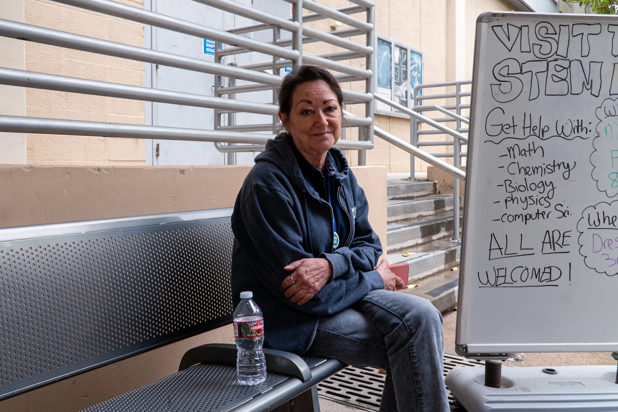  Lisa Woldt, an instructional writing tutor at Santa Monica College (SMC), sits in front of Drescher Hall on the main SMC campus, Wednesday, July 1, in Santa Monica, Calif. Woldt was not personally impacted by the 2025 Pacific Palisades Fire, but had