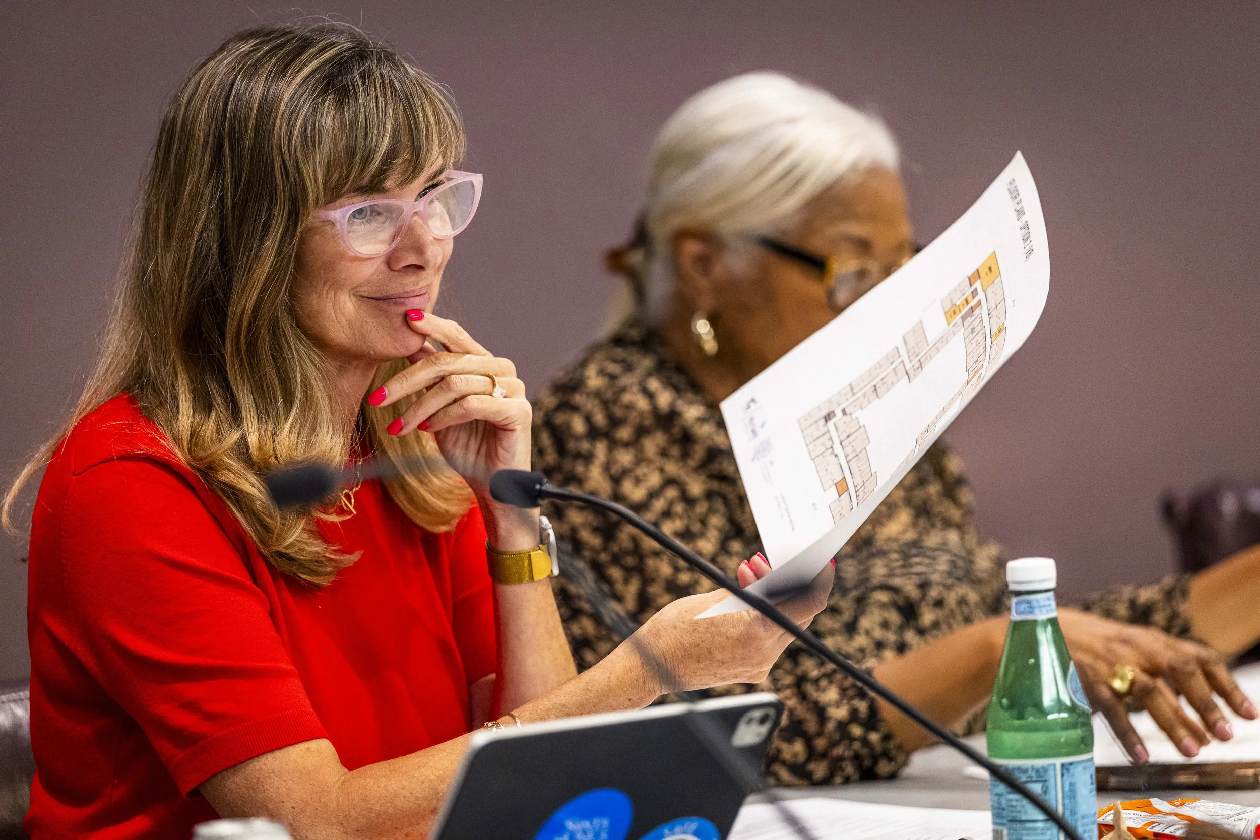  Santa Monica College (SMC) Board of Trustees members Anastasia Foster (Left) and Kathryn E. Jeffery (Right) discuss funding for the student housing program proposal during an SMC Board of Trustees meeting on Tuesday, Sep. 8, 2026, at the SMC Board R