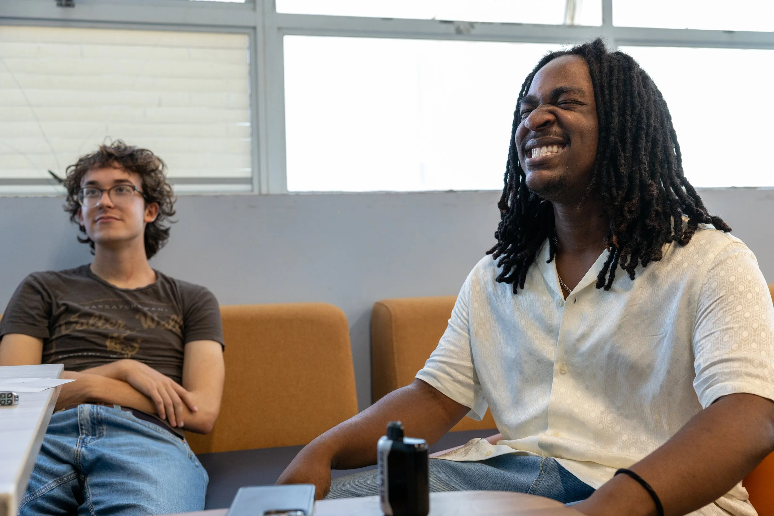  Chase Spann, 20 (right), with Brett Shelton (Left), discussing his opinions on Charlie Kirks death, a year after it happened, at Santa Monica College, Santa Monica, Calif. Thursday, September 10th, 2026. Spann is trying not to laugh after 3 of his c