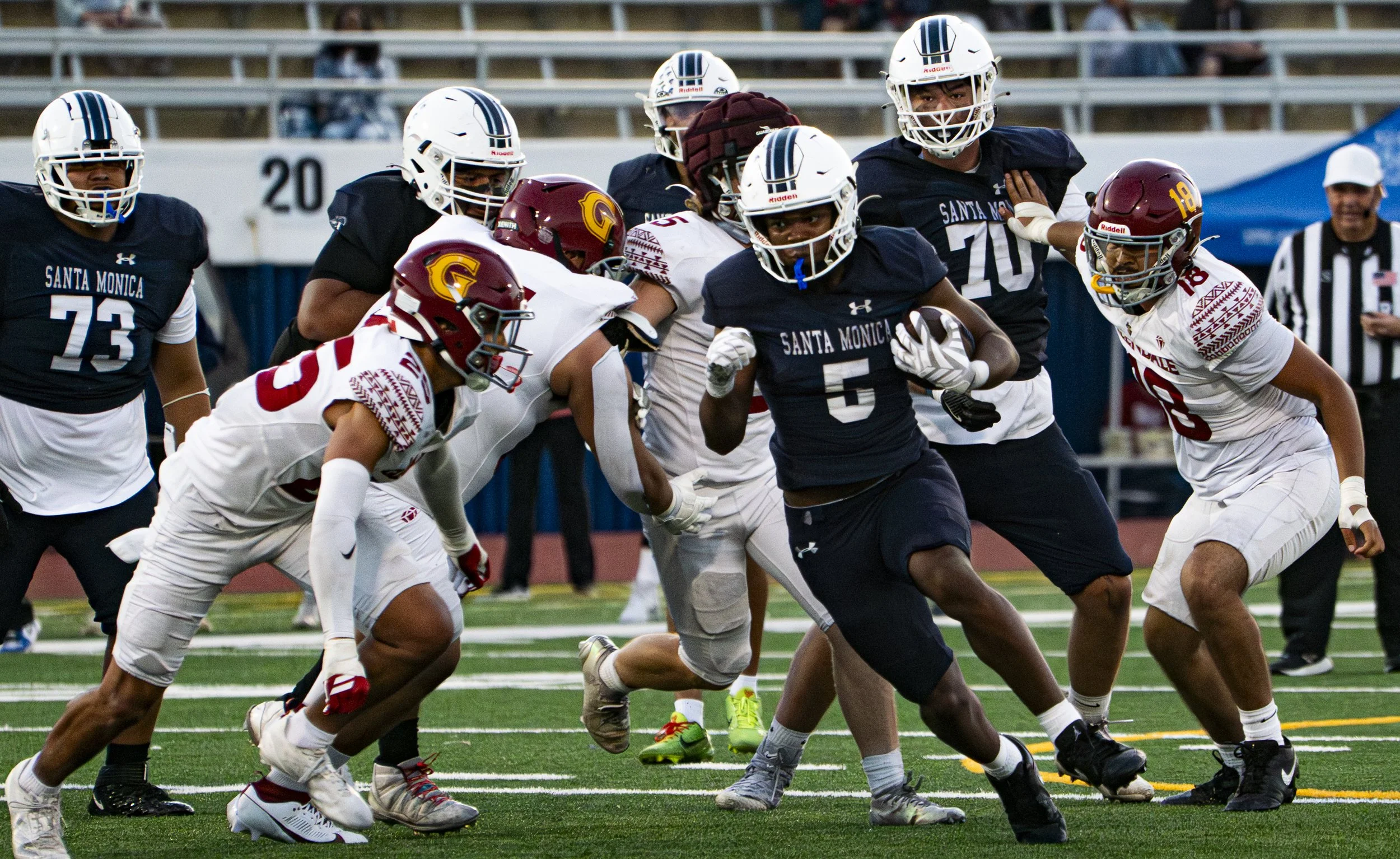  Santa Monica College (SMC) Corsairs running back #5 Dylan Franklin attempts to break through Glendale Community College (GCC) Vaqueros defensive during the second half of the home game were SMC Corsairs beat the Glendale Community College (GCC) Vaqu