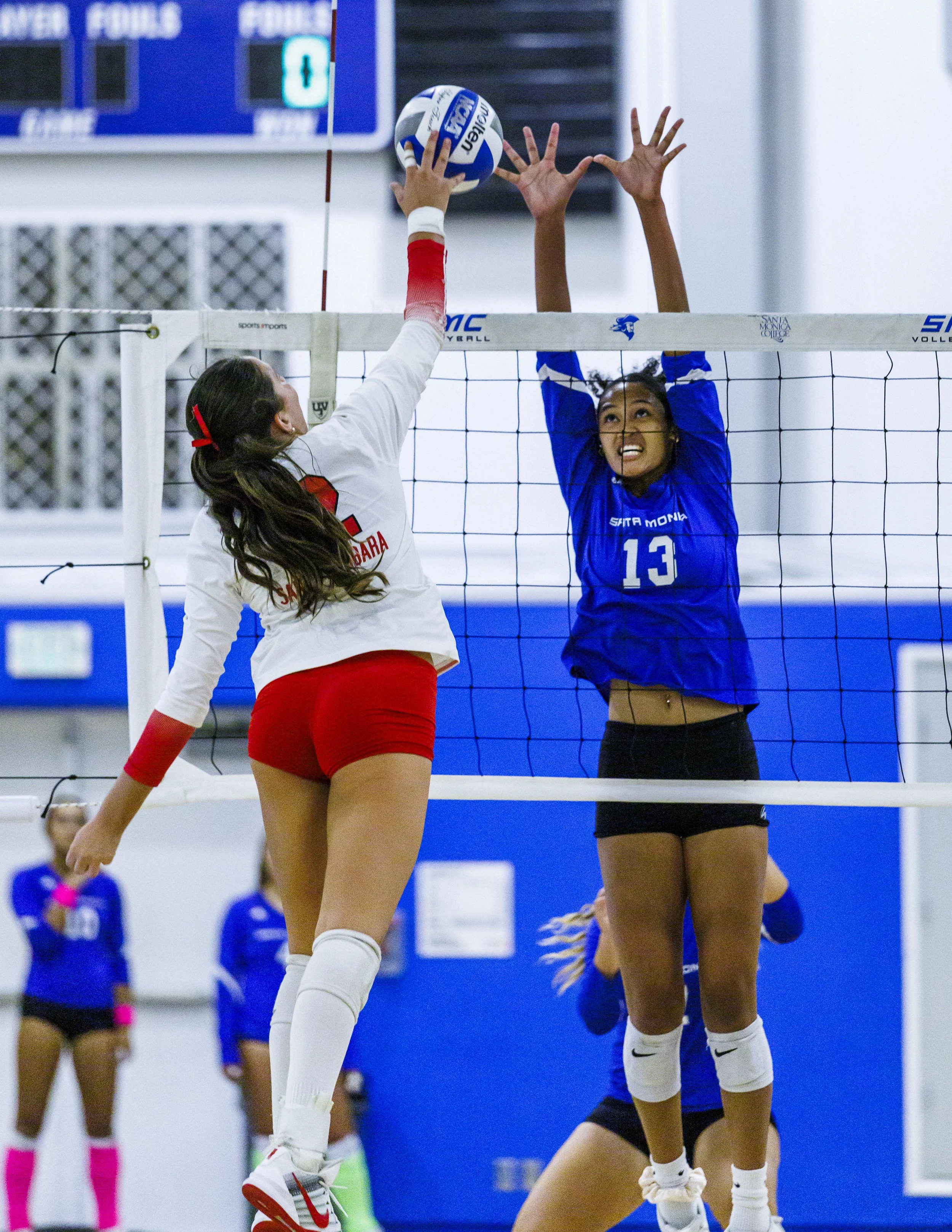  Santa Monica College (SMC) Corsairs Nadene Laalaai Taase (13) (Right) tries to block a shot from Santa Barbara City College Vaquero Juliette Dekker (12) (Left) during their game on Wednesday, September 23, 2026, at the SMC Corsair Gym in Santa Monic
