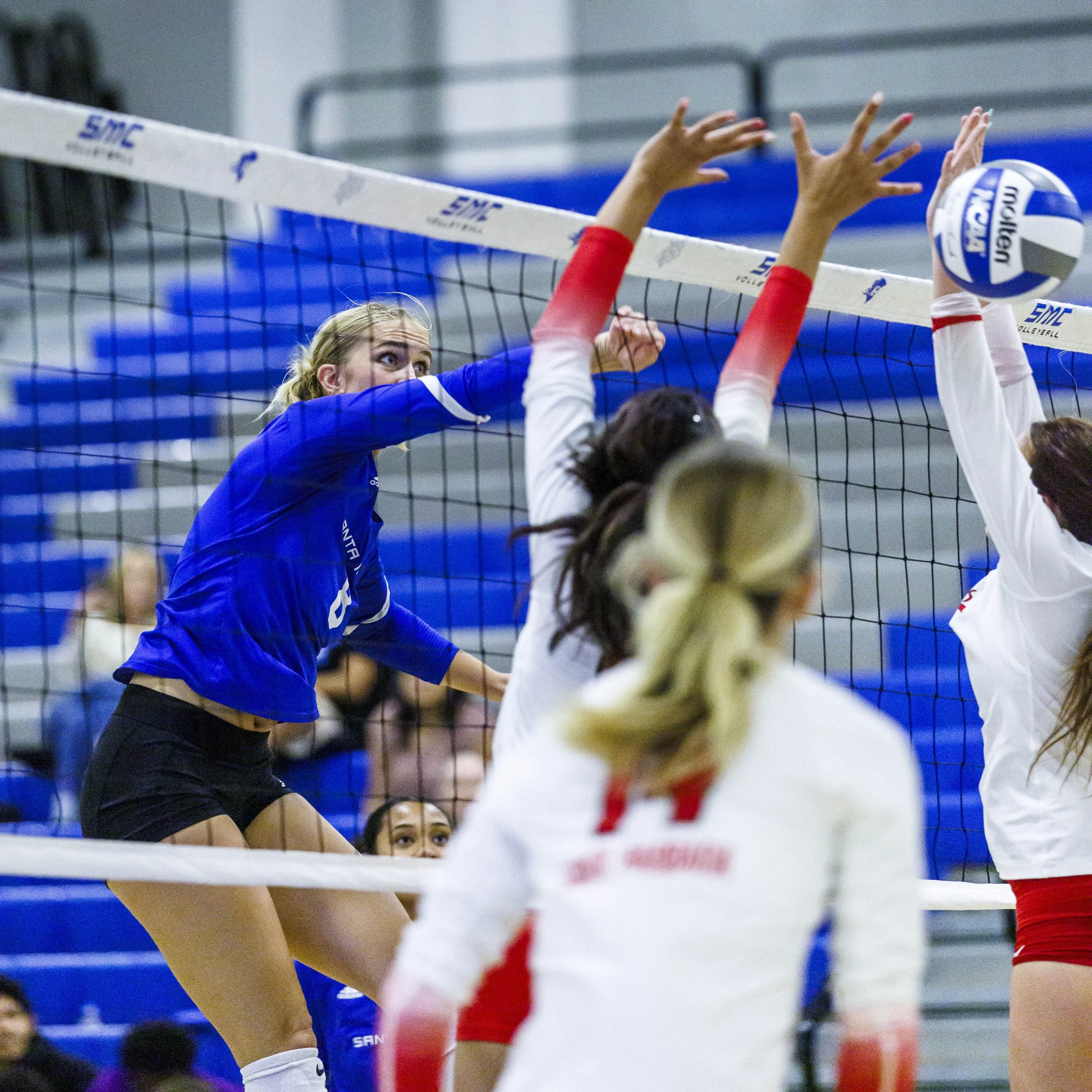  Santa Monica College (SMC) Corsairs Anna Hockett (8) (Left) spikes the ball past Santa Barbara City College Vaqueros during their game on Wednesday, September 23, 2026, at the SMC Corsair Gym in Santa Monica, Calif. The Corsairs defeated the Vaquero