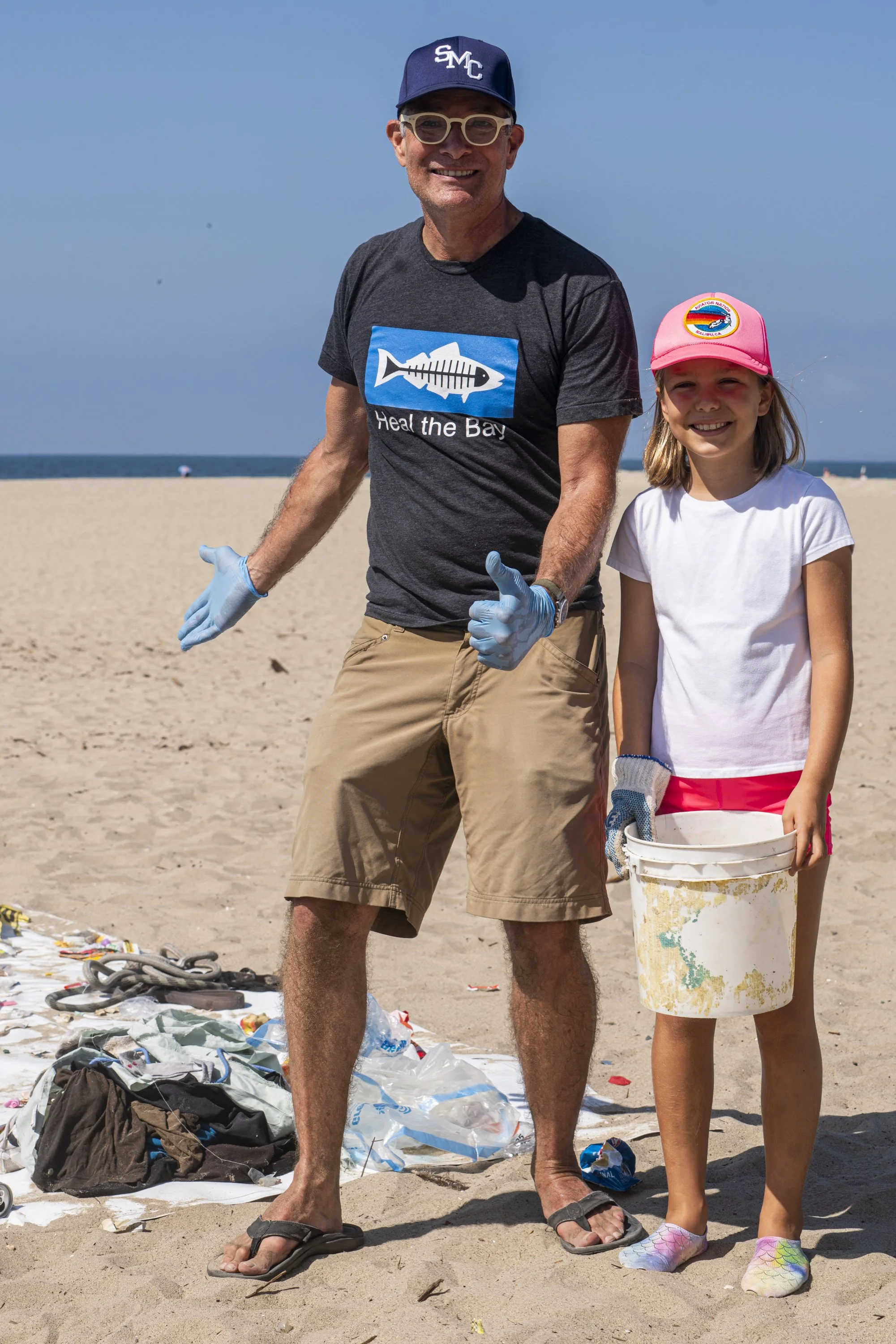  (L-R) Site Captain of the coastal clean up & Santa Monica Sustainability Director Ferris Kawar & Myra Onen (age 8), Onen is a first year volunteer of the annual event at Santa Monica coastal clean up in Santa Monica, Calif., Saturday Sept. 19, 2026 