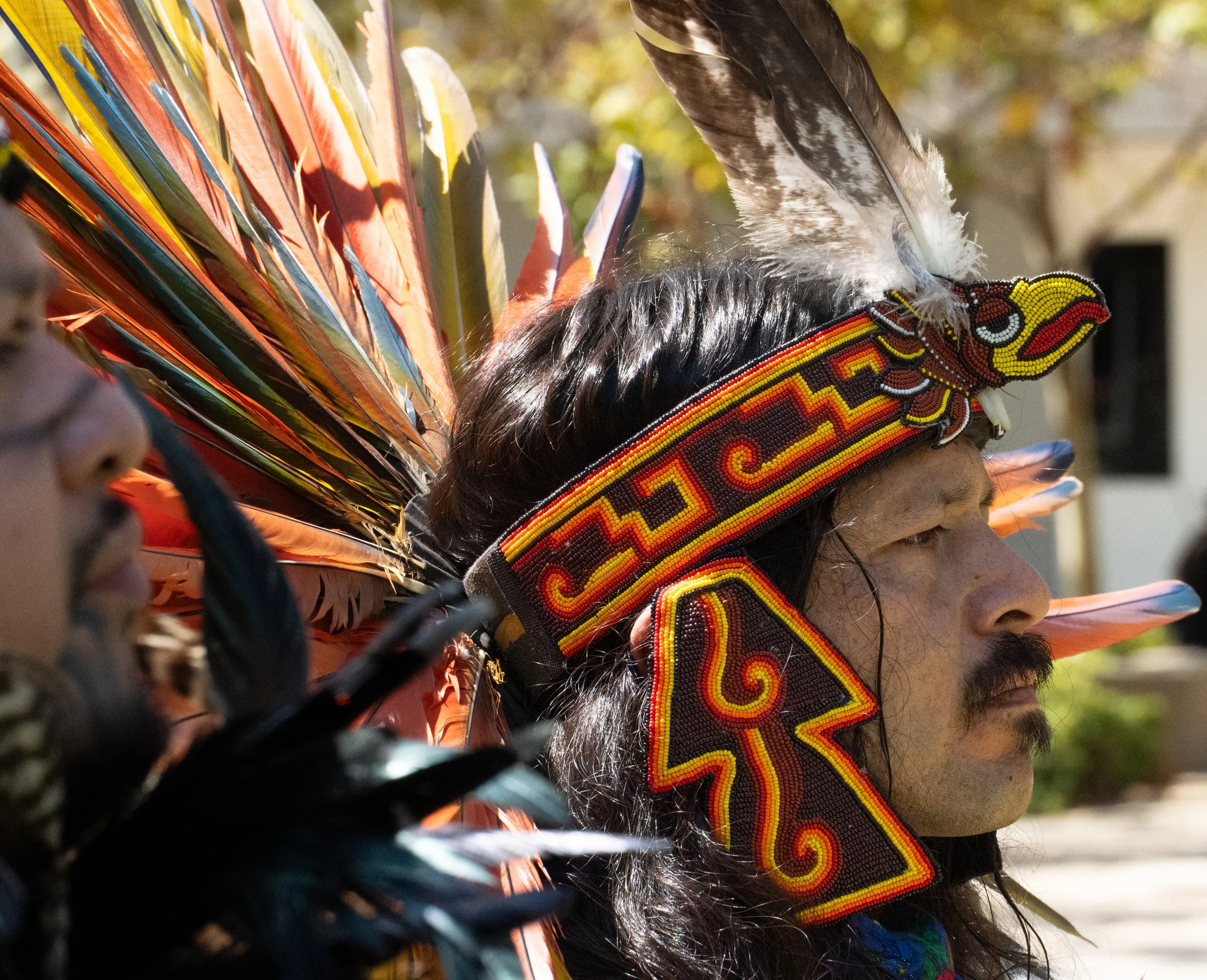  Aztec Dancer and leader of the performance, Xochipilli Medrano wears a beaded headpiece showing a traditional bird during a Latinx Heritage Month performance at Santa Monica College in Santa Monica, Calif., on thursday, Sept. 17th, 2026. The Evnt ha