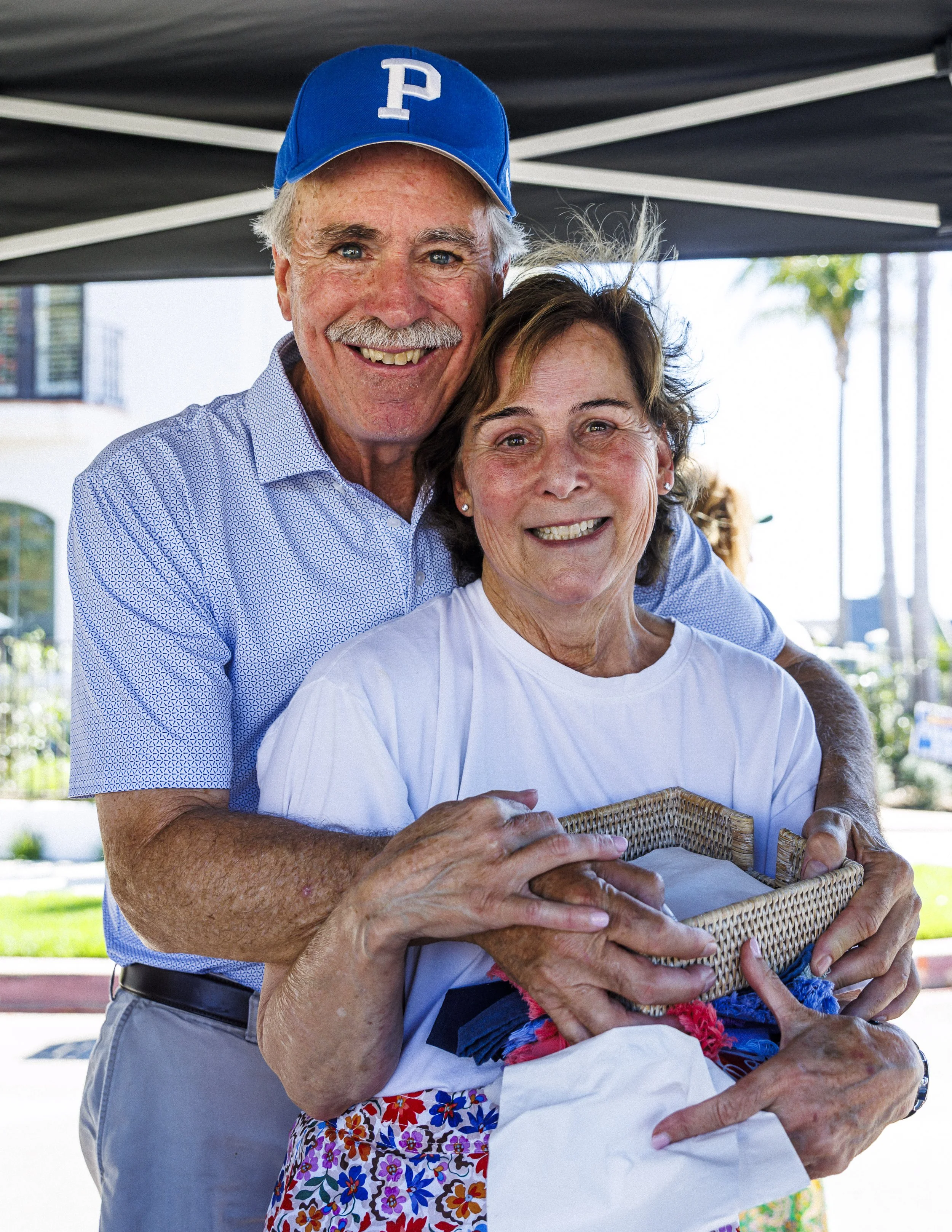  Pacific Palisades community members Robert Lamb (Left) and Nancy Lamb (Right) pose for a photograph during the second annual Longest Table Potluck Picnic Sunday, Oct. 4, 2026, on Pampas Ricas Blvd. in Pacific Palisades, Calif. The event was organize
