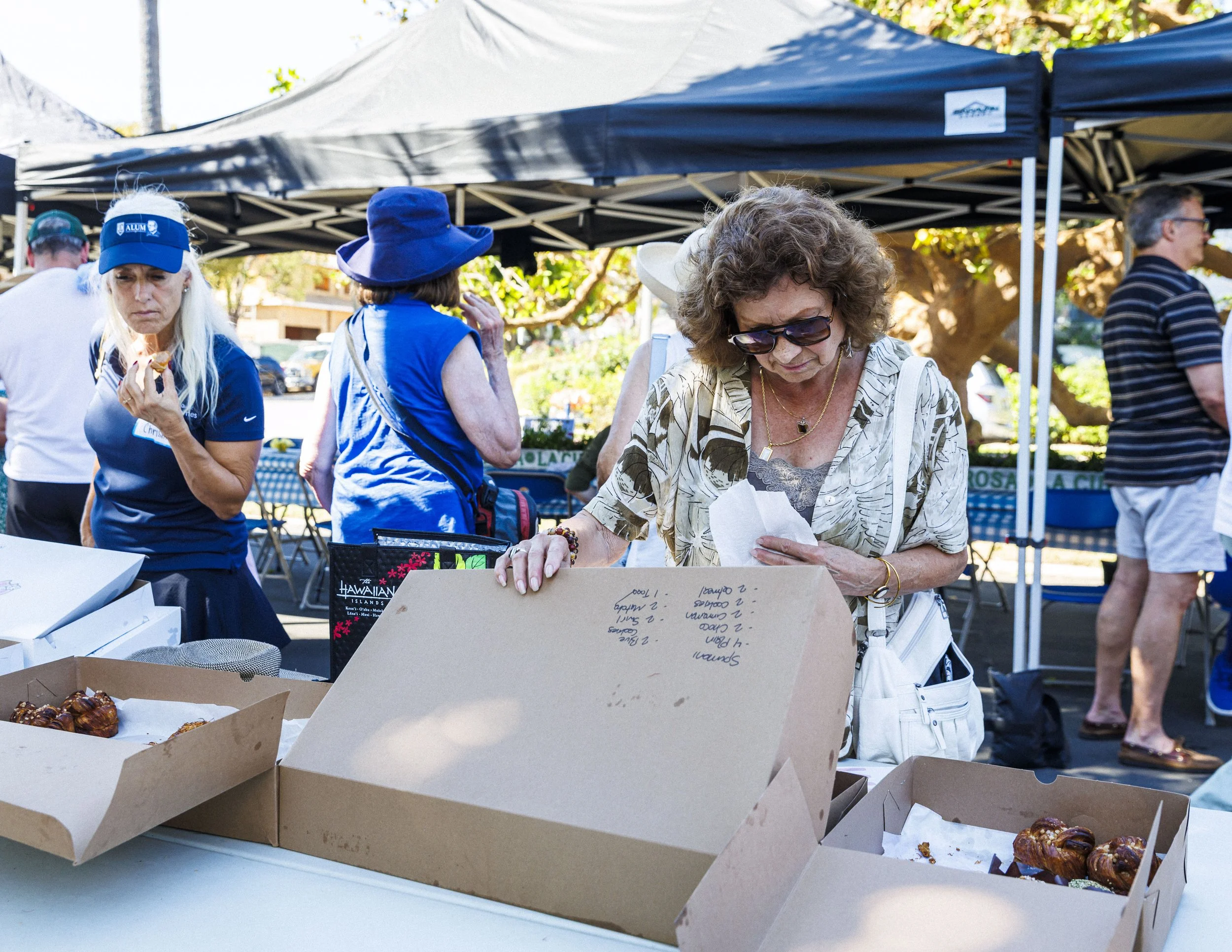  Pacific Palisades community members enjoy food during the second Annual Longest Table Potluck Picnic on Sunday, Oct. 4th, 2026, at Pampas Ricas Blvd in Pacific Palisades, Calif. The event is organized by residents Billy Jones, Lee Ann Daly, Deb Jave