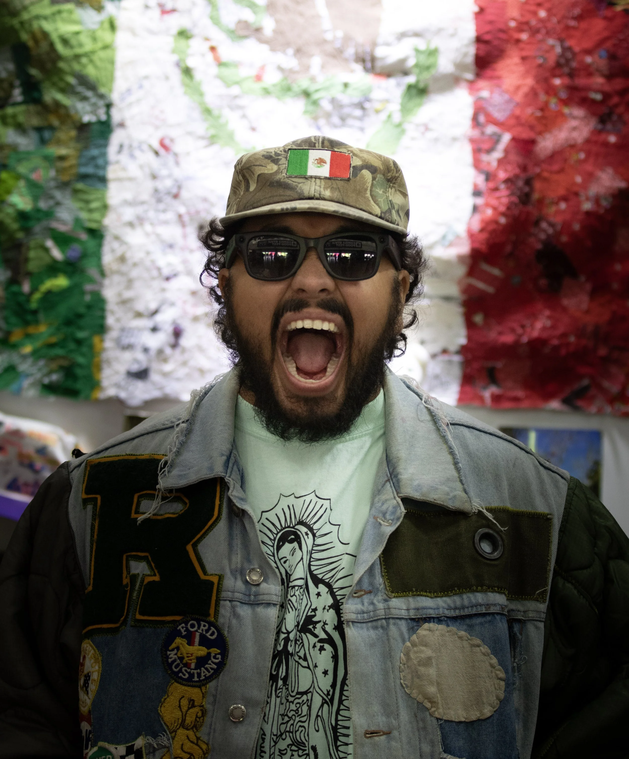  Jose Ramirez, owner of the Mexican fashion clothing brand LAST CALL, standing in front of his hand-sewn Mexican flag he made for Complex Con held at the Los Angeles Convention Center on Sunday October 4th, 2026. Jose claims that LAST CALL’s clothing
