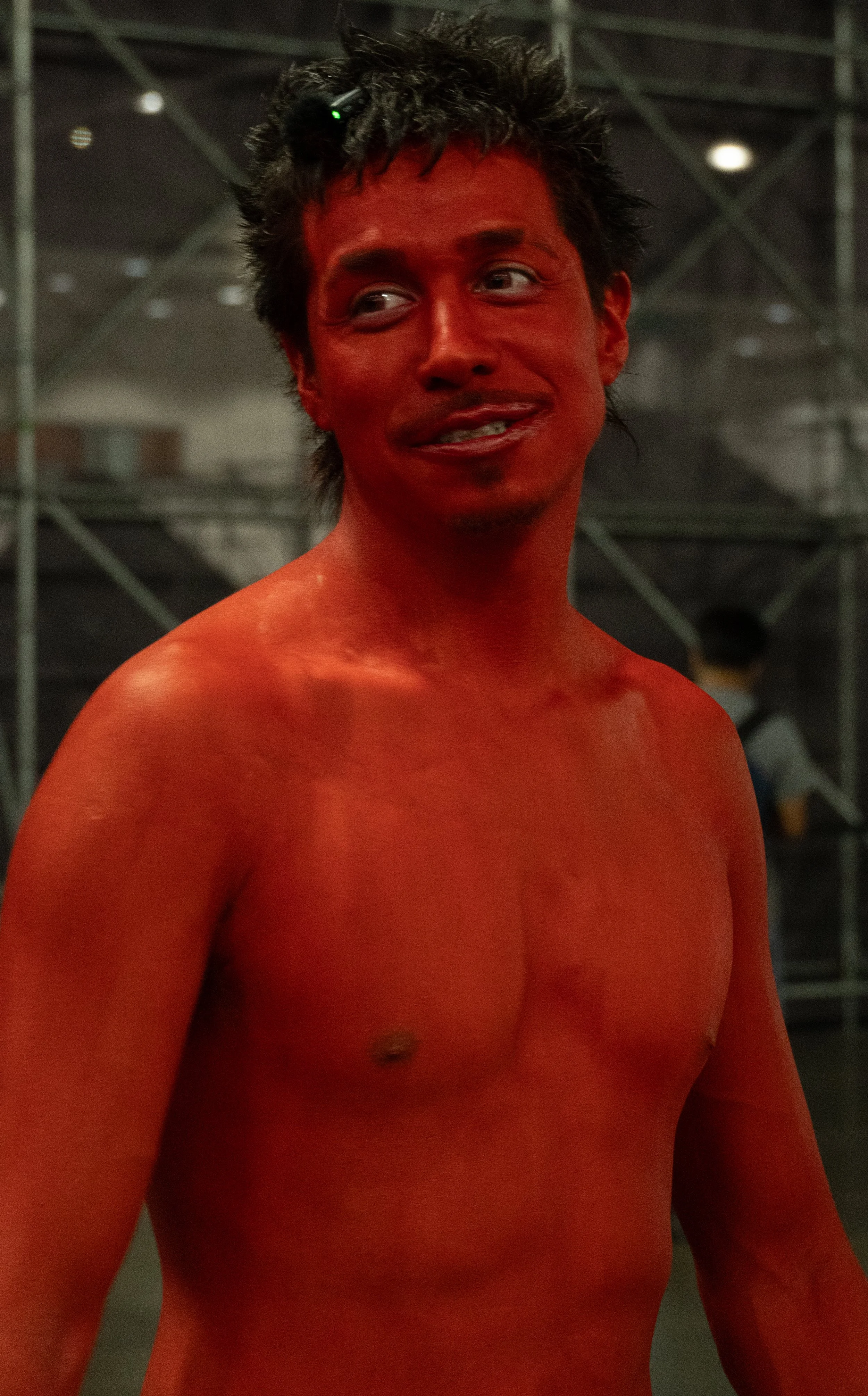  Popular Tiktoker _tavo777 attends Complexcon and meets fans while painting himself red for his video in the Los Angeles Convention Center on October 3rd, 2026. 
