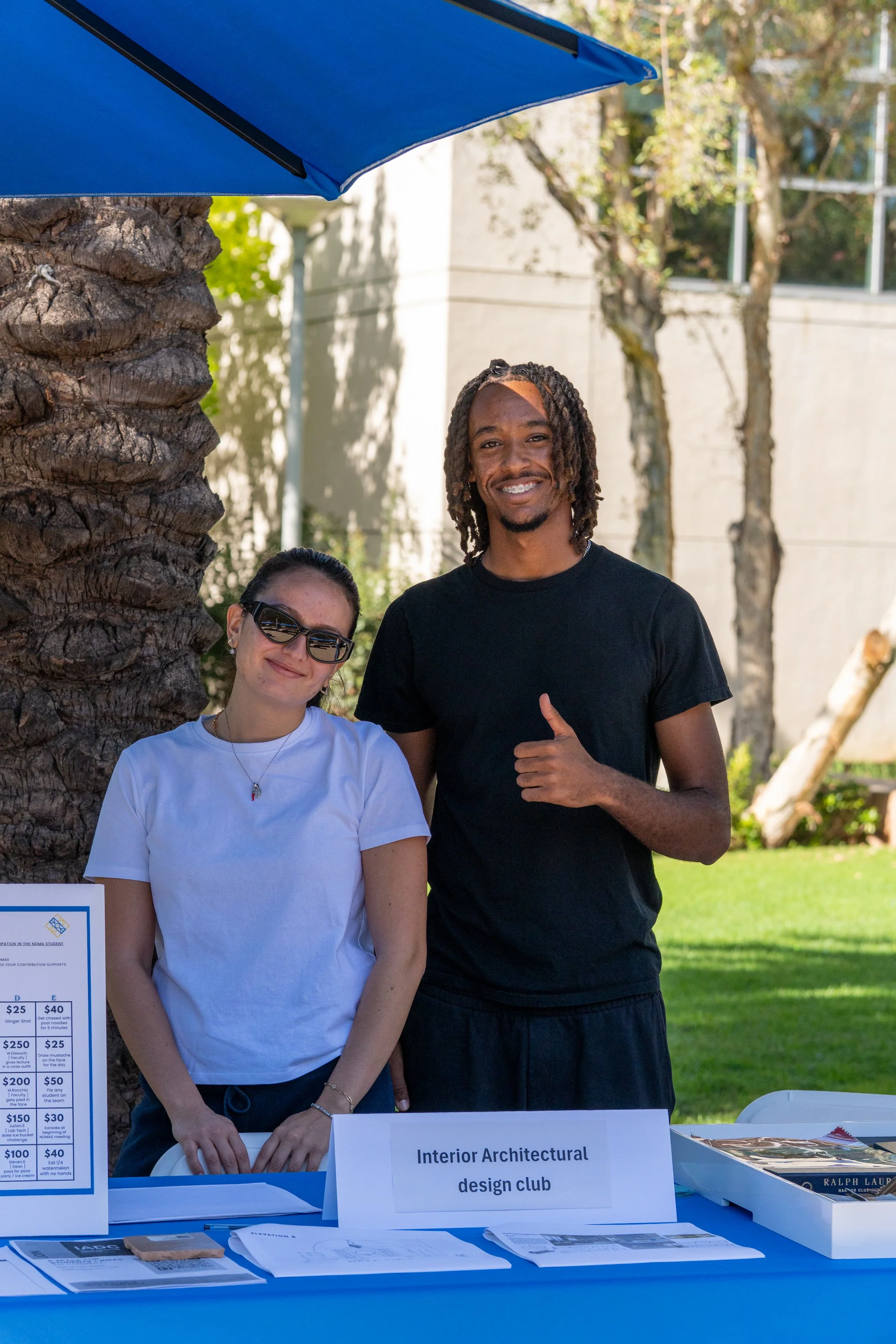  Interior Architectural Design Club president Clara De Donno, left, and Inter-Club Council representative Yishak Yetemgeta pose at the club's table during Club Awareness on the Main Quad at Santa Monica College in Santa Monica, Calif., on Tuesday, Se