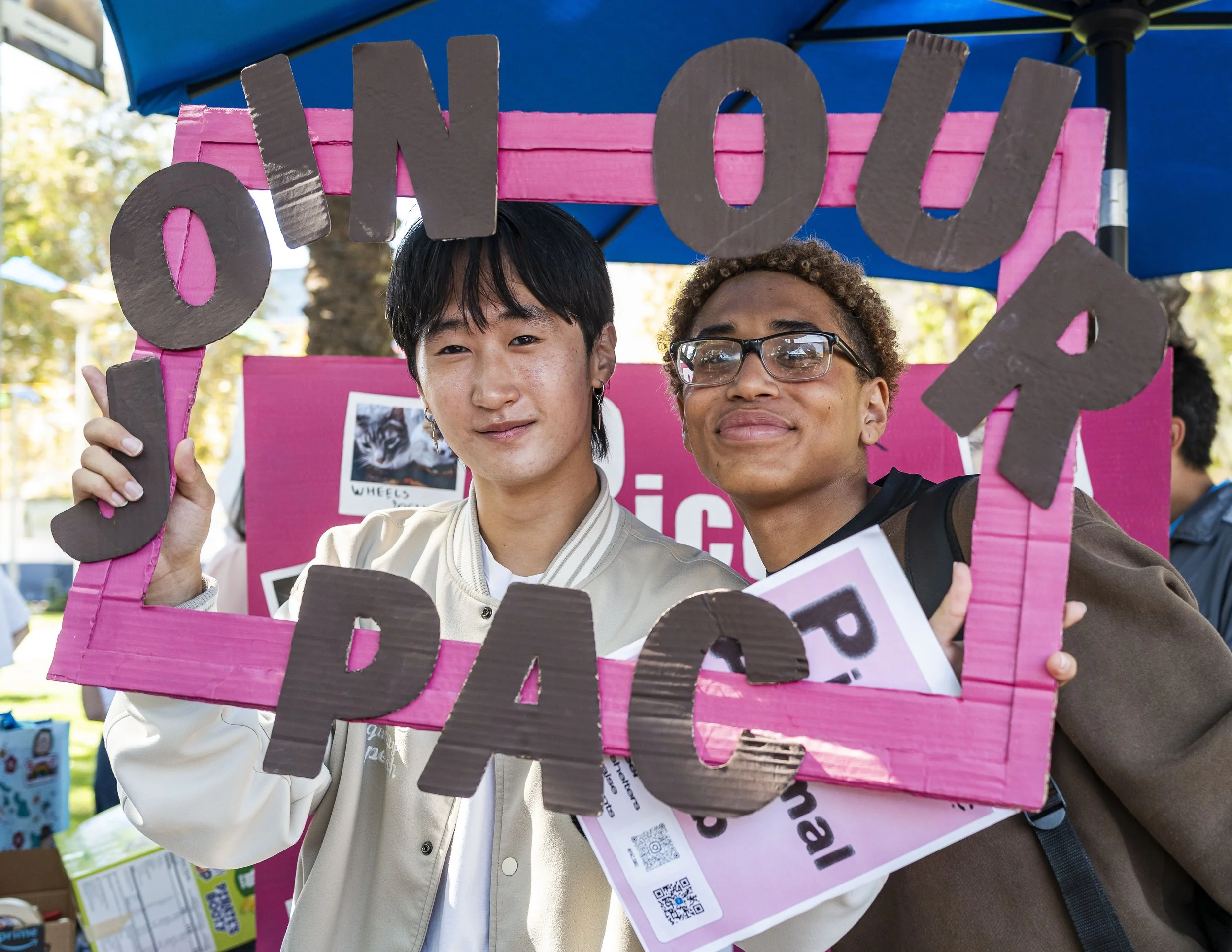  Santa Monica College (SMC) Pico Animal Club (PAC) Secretary Joseph Hwang (Left) poses with SMC student Jeryko Niba (Right) during Club Awareness Day on the SMC Main Campus Quad on Tuesday, Sept. 29th, 2026, in Santa Monica, Calif. Hwang is one of th
