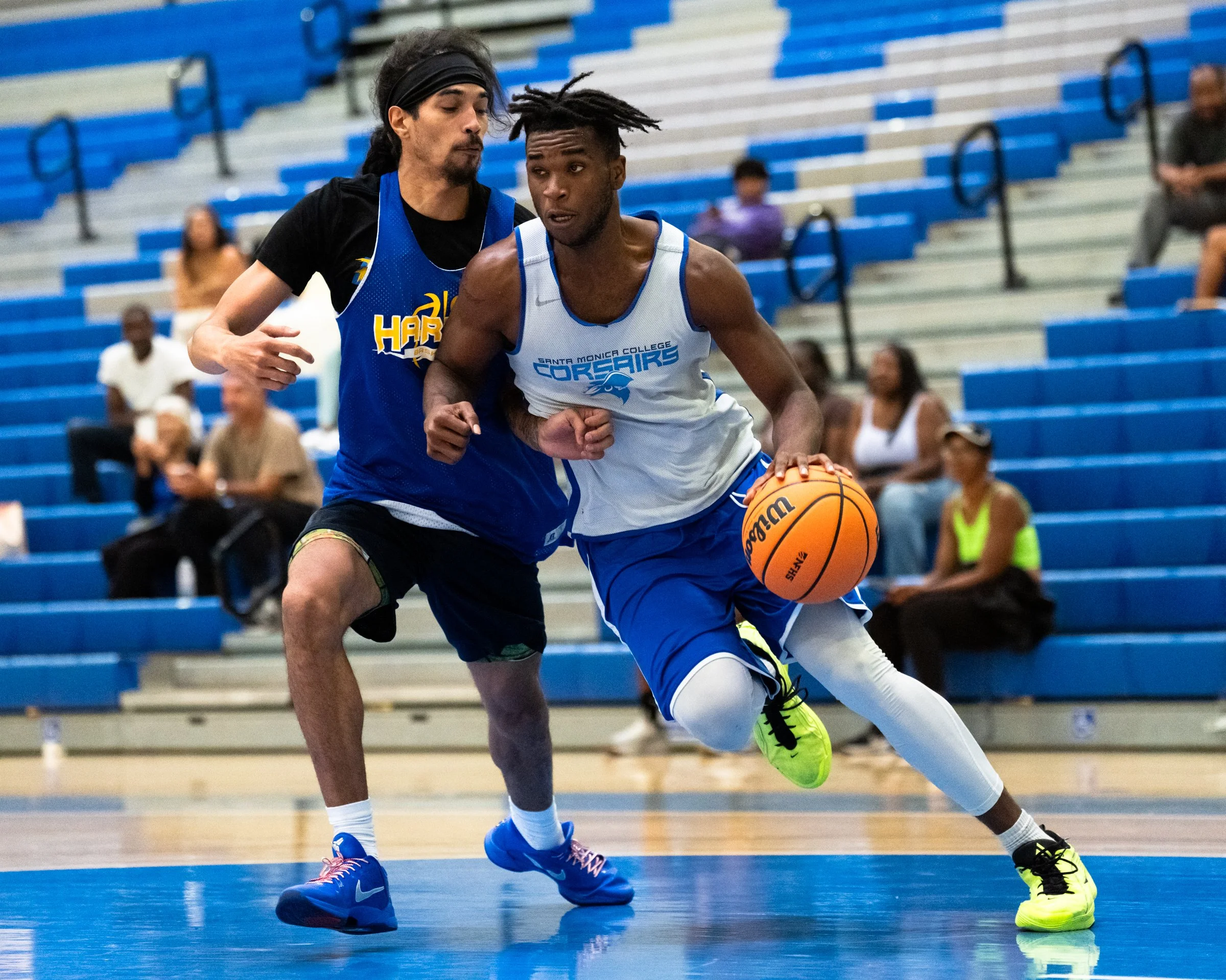  The Santa Monica College (SMC) Corsairs Men’s basketball Micah Blackman (3) dribbles by LA Harbor College Seahawks defender and looks to attack the goal in the second half of the scrimmage game on Friday, Oct. 16, 2026, at Corsair Gym in Santa Monic