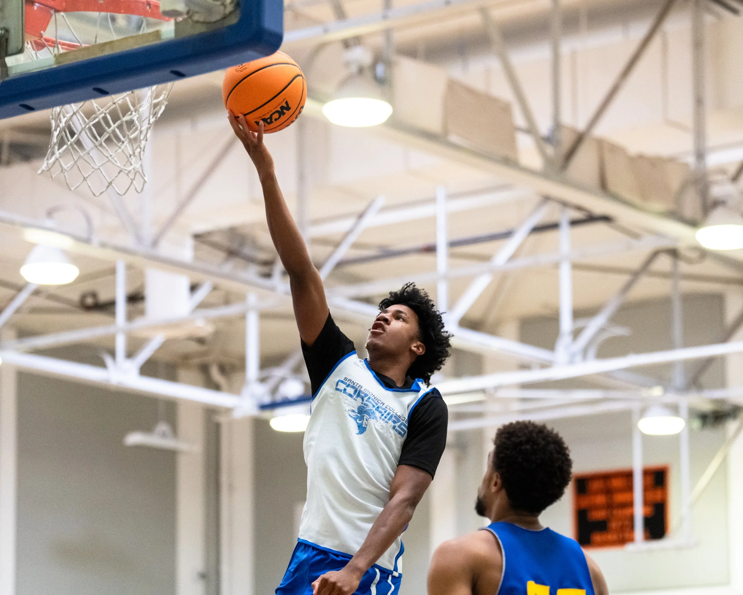  The Santa Monica College (SMC) Corsairs Men’s basketball Jaylen Brown (12) with a lay up against LA Harbor College Seahawks defender in the second half of the scrimmage game on Friday, Oct. 16, 2026, at Corsair Gym in Santa Monica, Calif. Corsairs l