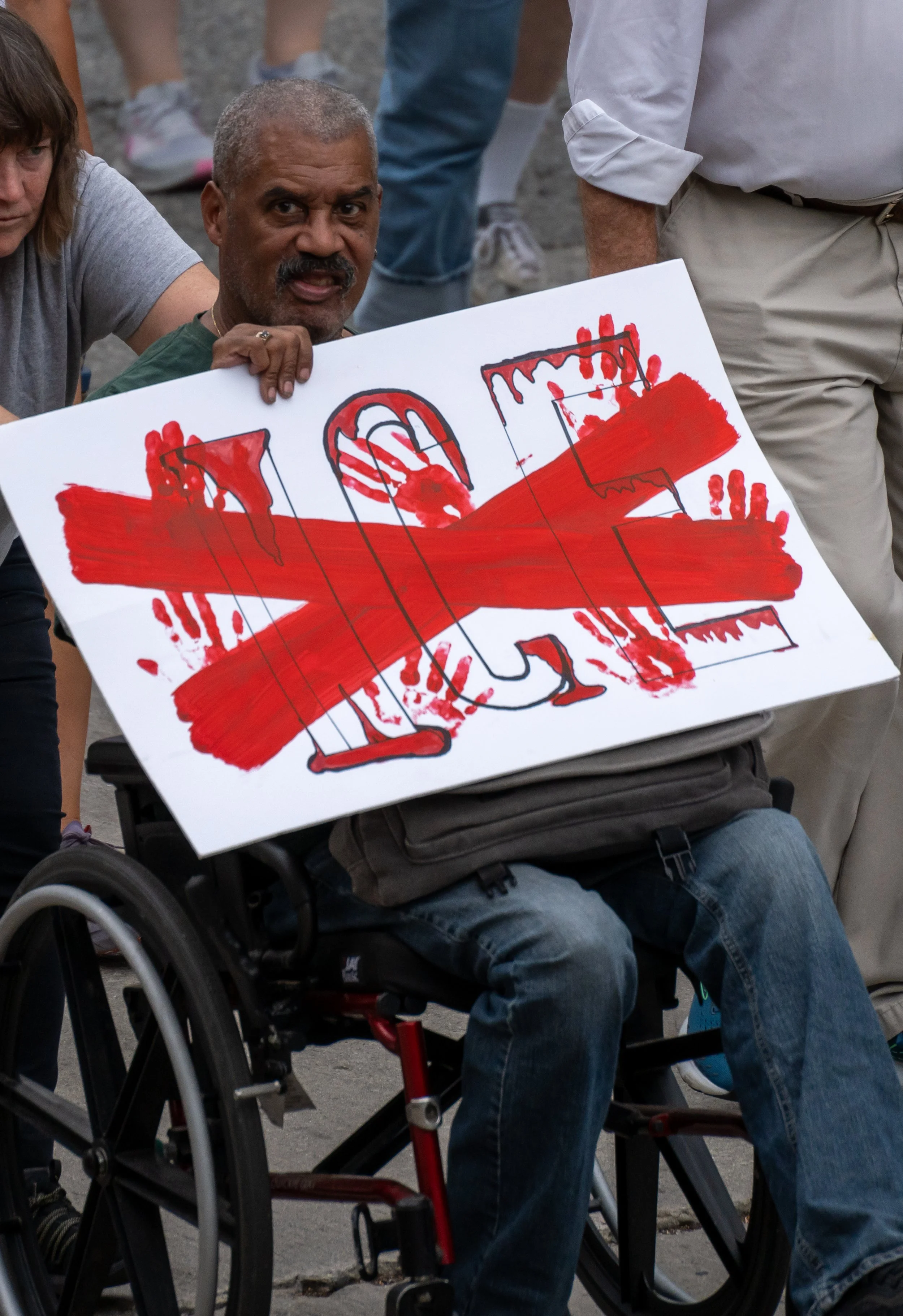  A Protester holding "ICE Crossed out with Red color" during the march outside Los Angeles City Hall near Grand Park in downtown Los Angeles, Calif. Saturday, Oct. 17. (Jose Hernandez | The Corsair) 