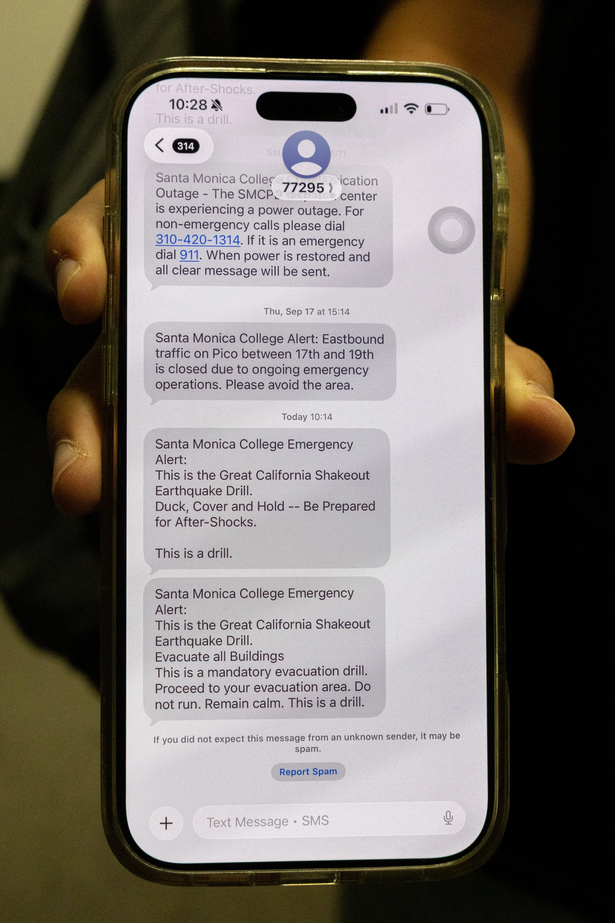  A student shows text alerts from Santa Monica College about the Great California ShakeOut earthquake drill at the Center for Media and Design in Santa Monica, Calif., on Thursday, Oct. 15, 2026. The first alert, sent at 10:14 a.m., told students to 