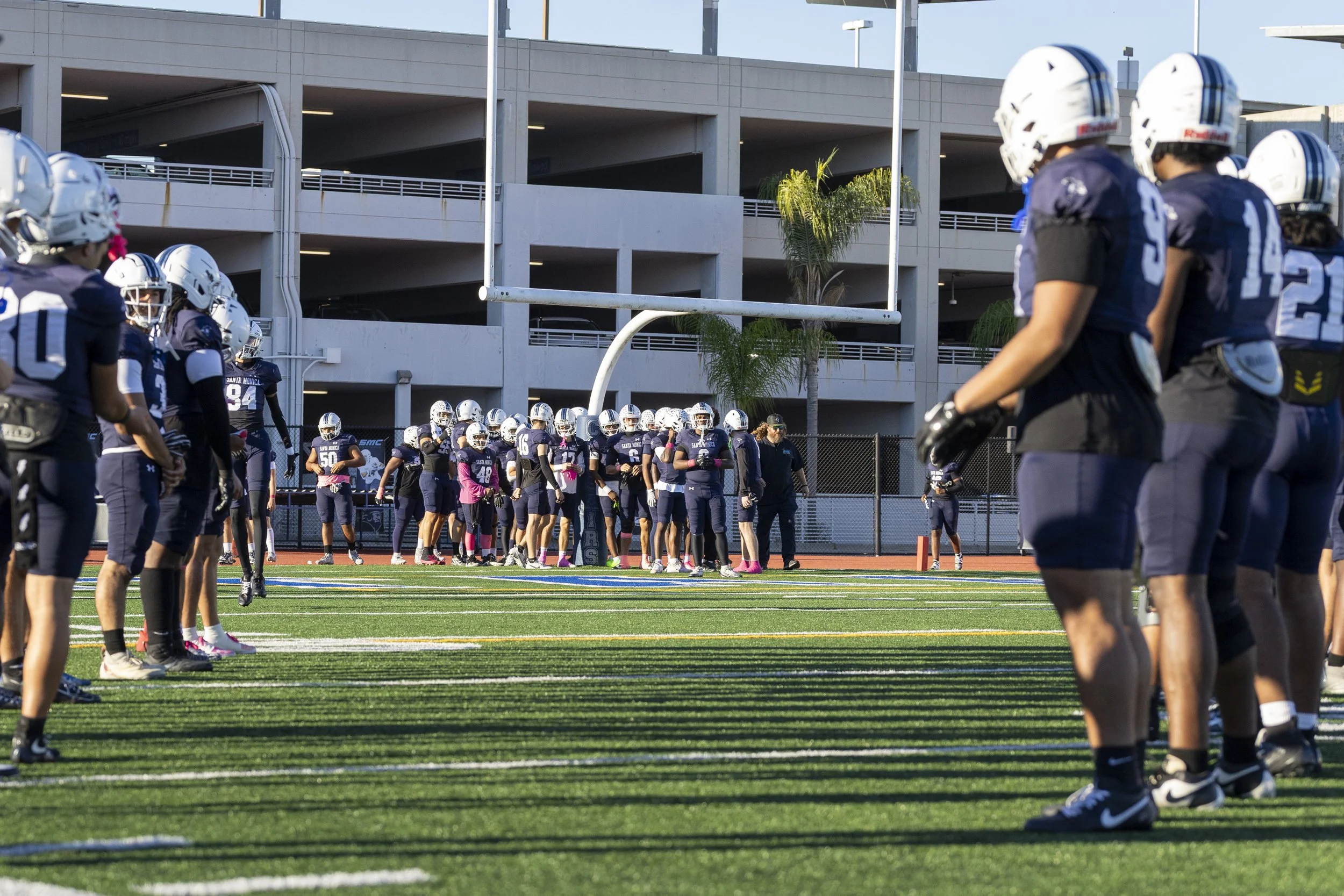  Santa Monica College (SMC) football coach Kelly Ledwith gathers with the Corsairs’ sophomores before they take the field for the Homecoming game against the West Los Angeles College Wildcats on Saturday, Oct. 24, 2026, at Corsair Field in Santa Moni