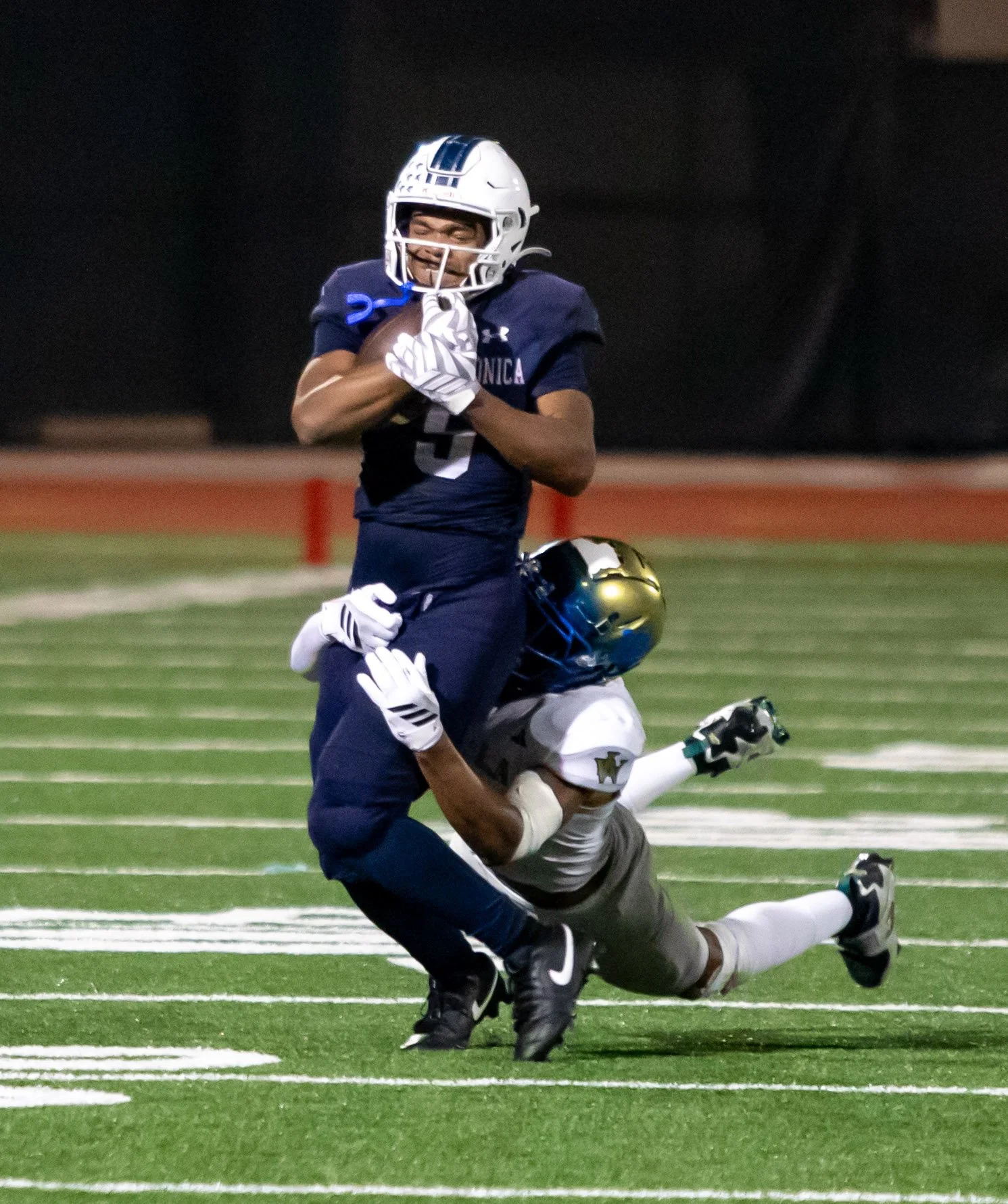  The Santa Monica College Corsairs' running back Dylan Franklin (5) gets tackled after a long gain at Corsair Field in Santa Monica, Calif., Saturday, October 24, 2026. Franklin scored 3 touhcdowns, rushing for over 200 yards, leading the Corsairs to