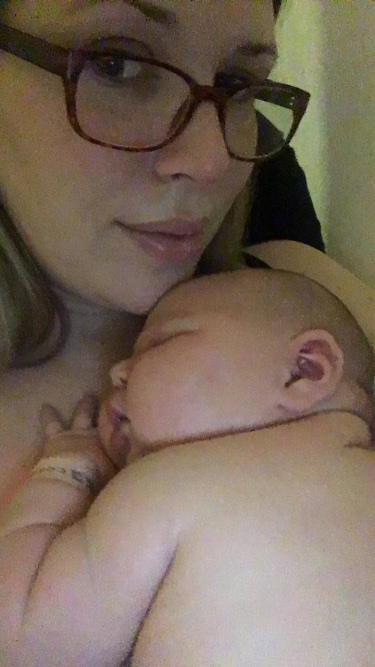 Our first night in the NICU, in the most uncomfortable wooden rocking chair EVER. I'll never forget it. 
