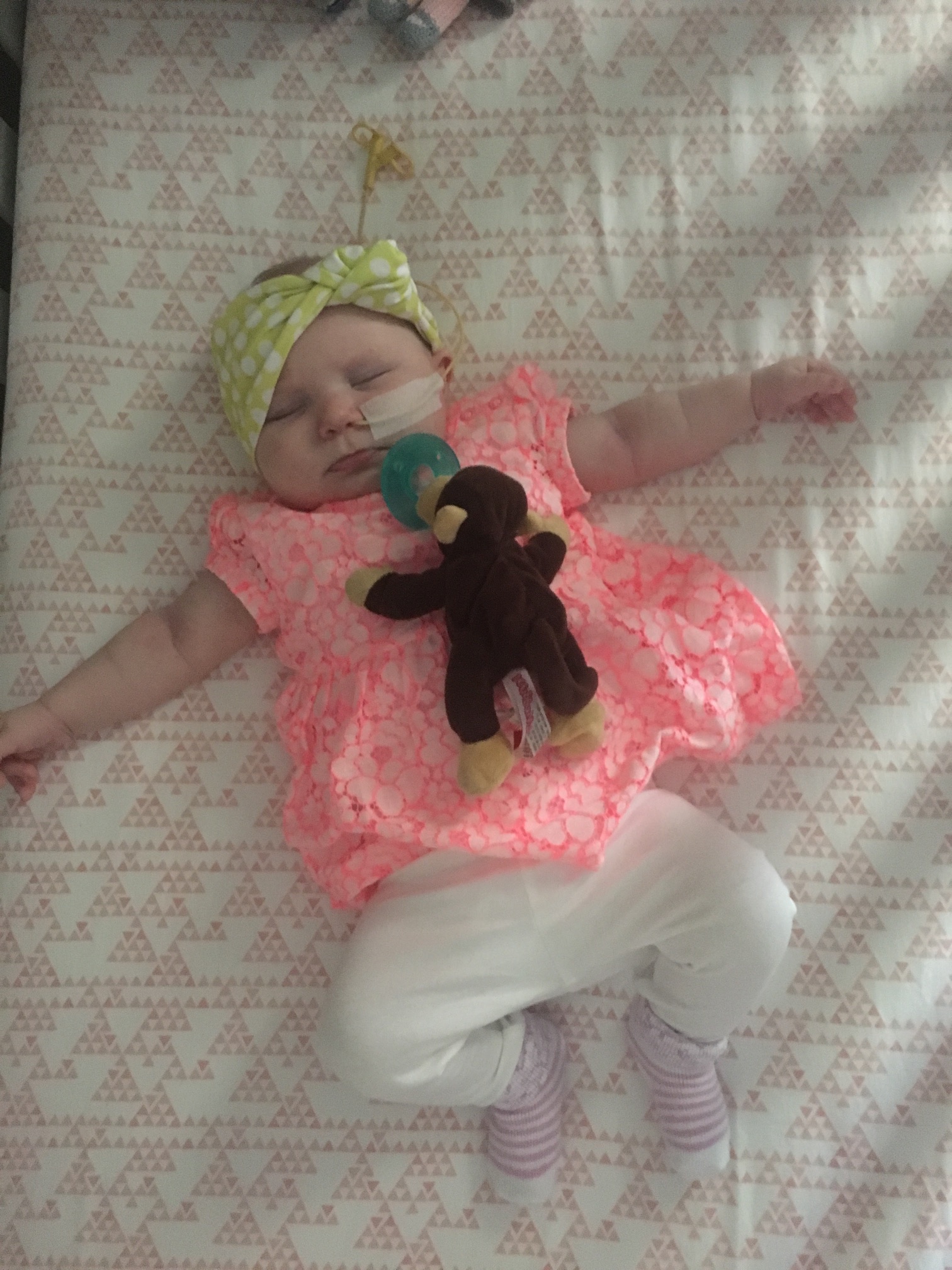 Sweet nugget sleeping in her crib for the first time. It lasted 20 minutes.