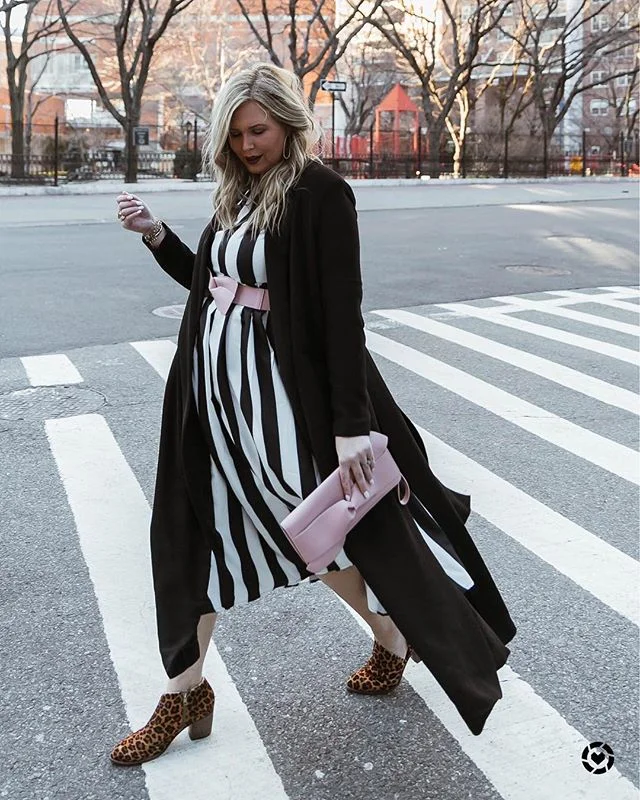 You don’t have to spend a ton of money to look like you got it goin’ on 😏 Several of you asked what I like to splurge on, and I told you not trendy items. Like these shoes and coat? They were an investment. But this bag and this amazing striped dress? On the cheap, like super mega under $20 cheap. I’ve had this trench coat for 4 years and I remember spending $98 on it - the quality and uniqueness was something I knew I’d never find again. This was one of my favorite #NYFW looks, hope you love it! http://liketk.it/2BbEe #liketkit @liketoknow.it #LTKcurves #LTKshoecrush #LTKstyletip #sizeinclusive