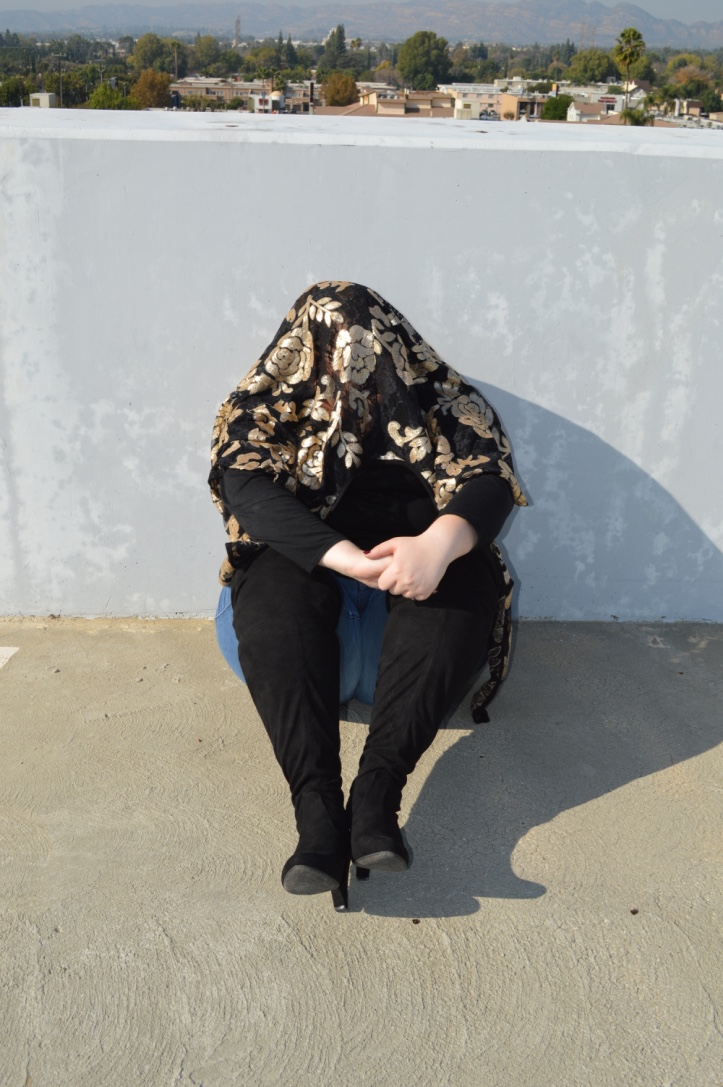 At a photo shoot feeling so bad about myself I had to cry and hide from the camera. 