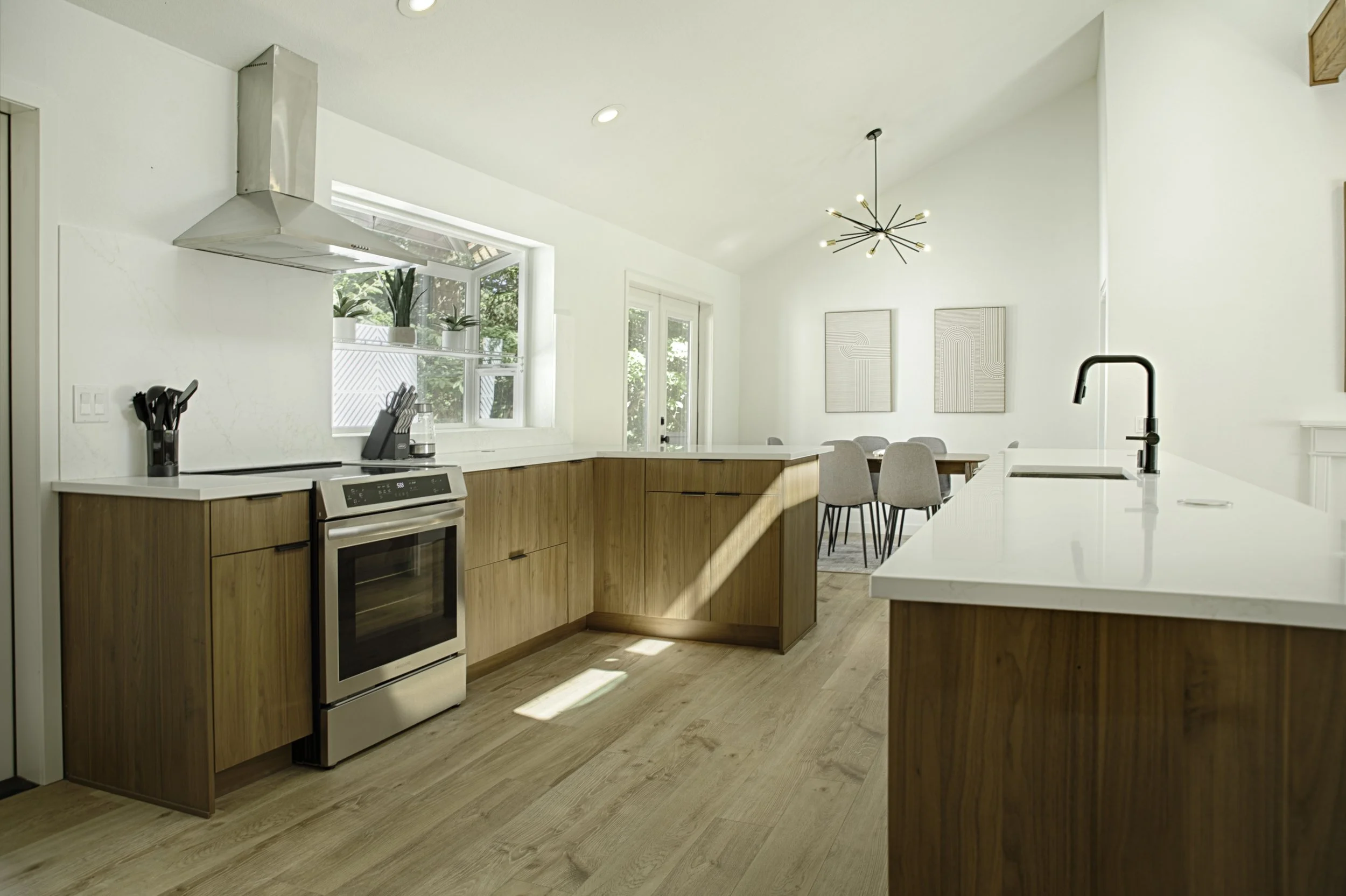 Kitchen features induction range for the ultimate cooking experience- safe and fast cooking. Better than gas and traditional electric