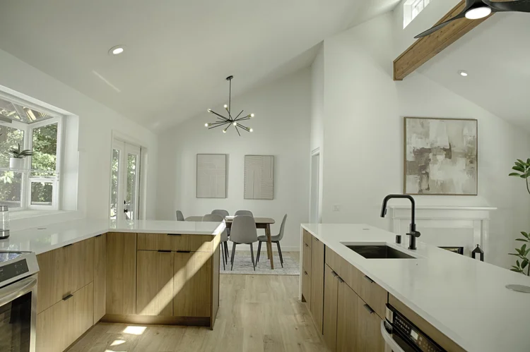 Kitchen and dining with vaulted ceilings