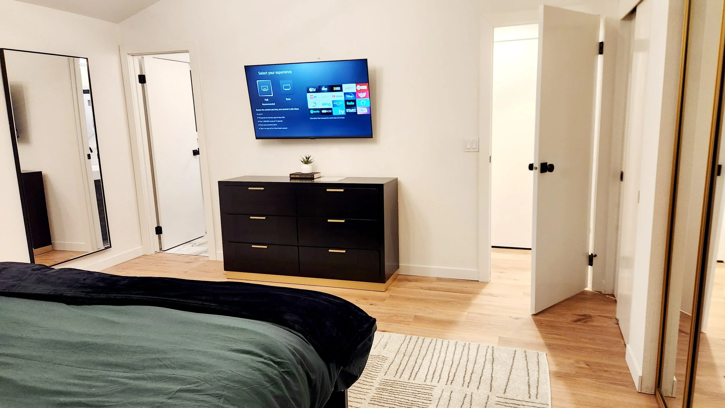 Newly added 50” TV for primary suite