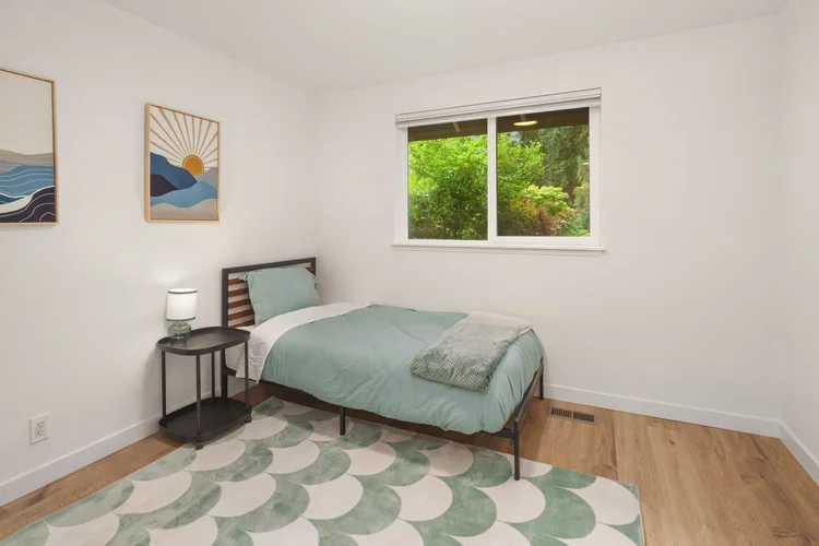 Third bedroom with twin size bed and plenty of extra space