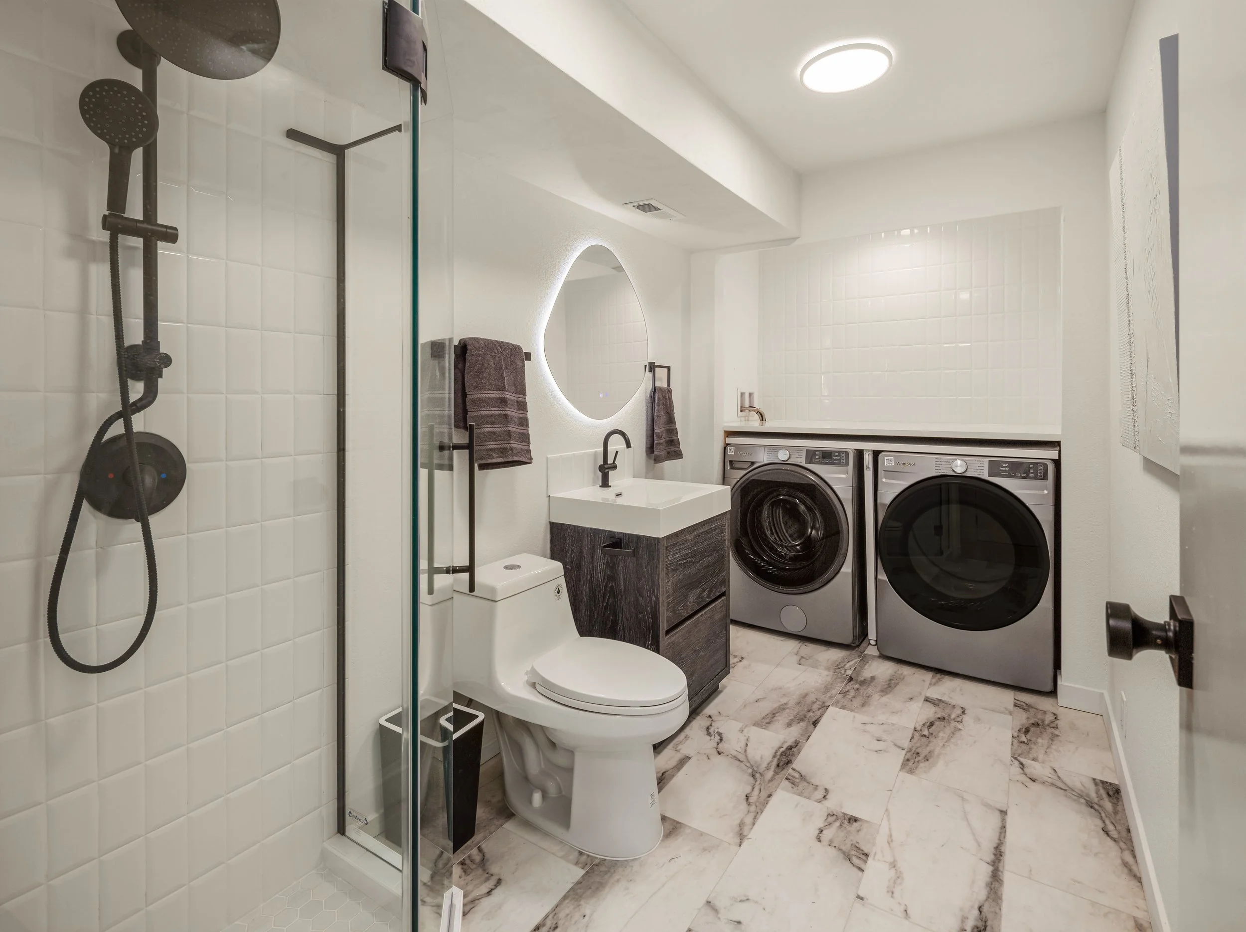 Third bathroom plus laundry, next to family room and office