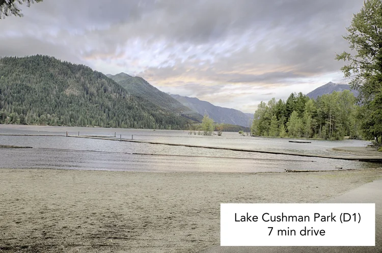 Sandy beach at Lake Cushman Park D1 with mountains beyond, 7 minute drive
