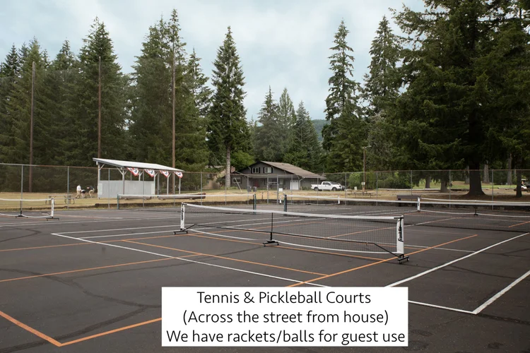 Tennis and pickleball courts across the street, with rackets and balls for guest use