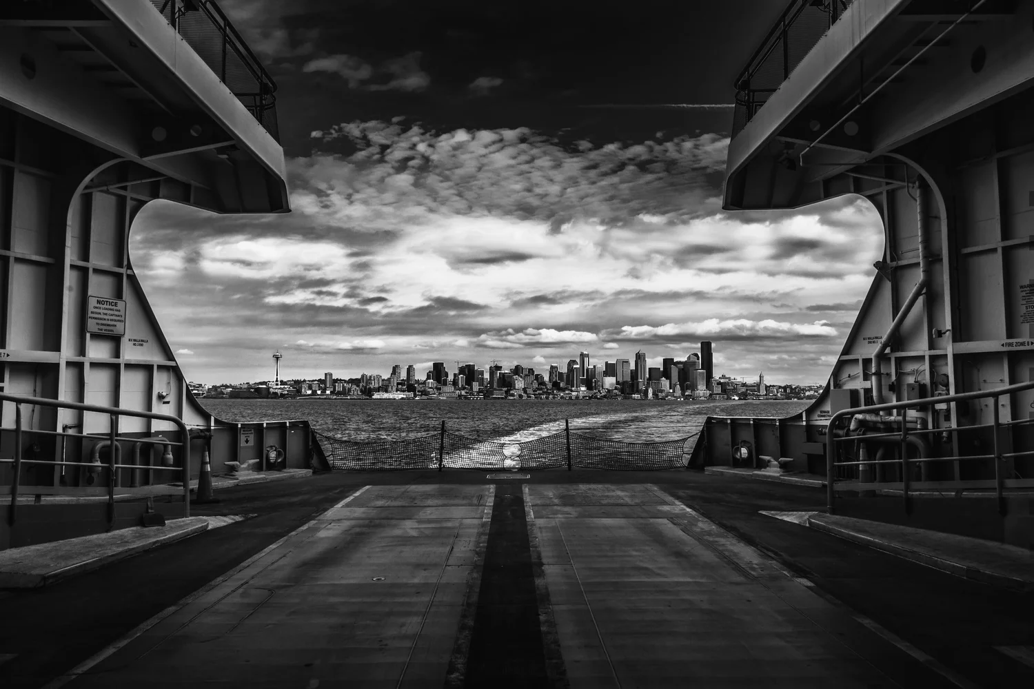 Seattle skyline seen from the open car deck of a Washington State ferry