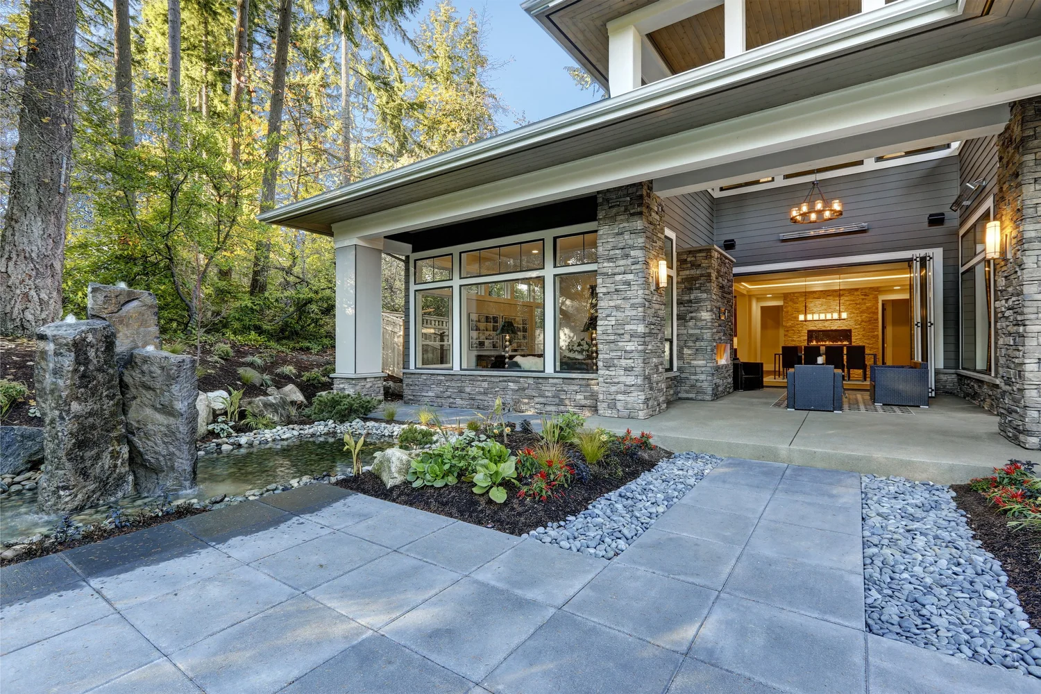 Stone and glass courtyard entry of a Mercer Island home sold by Brian Huie