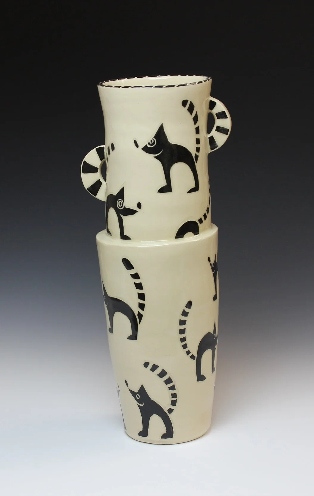 Vase with raccoon design