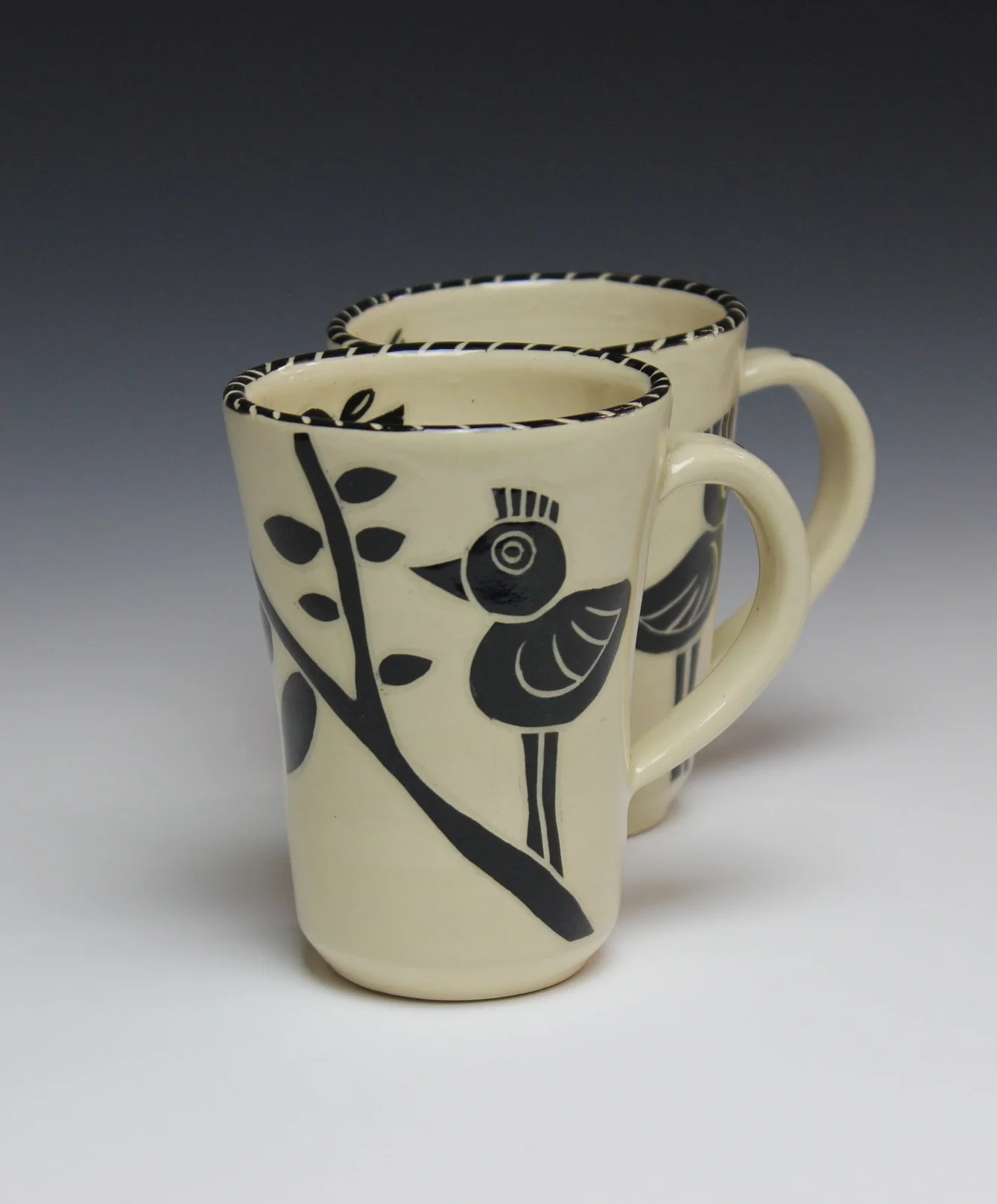Mugs with bird design