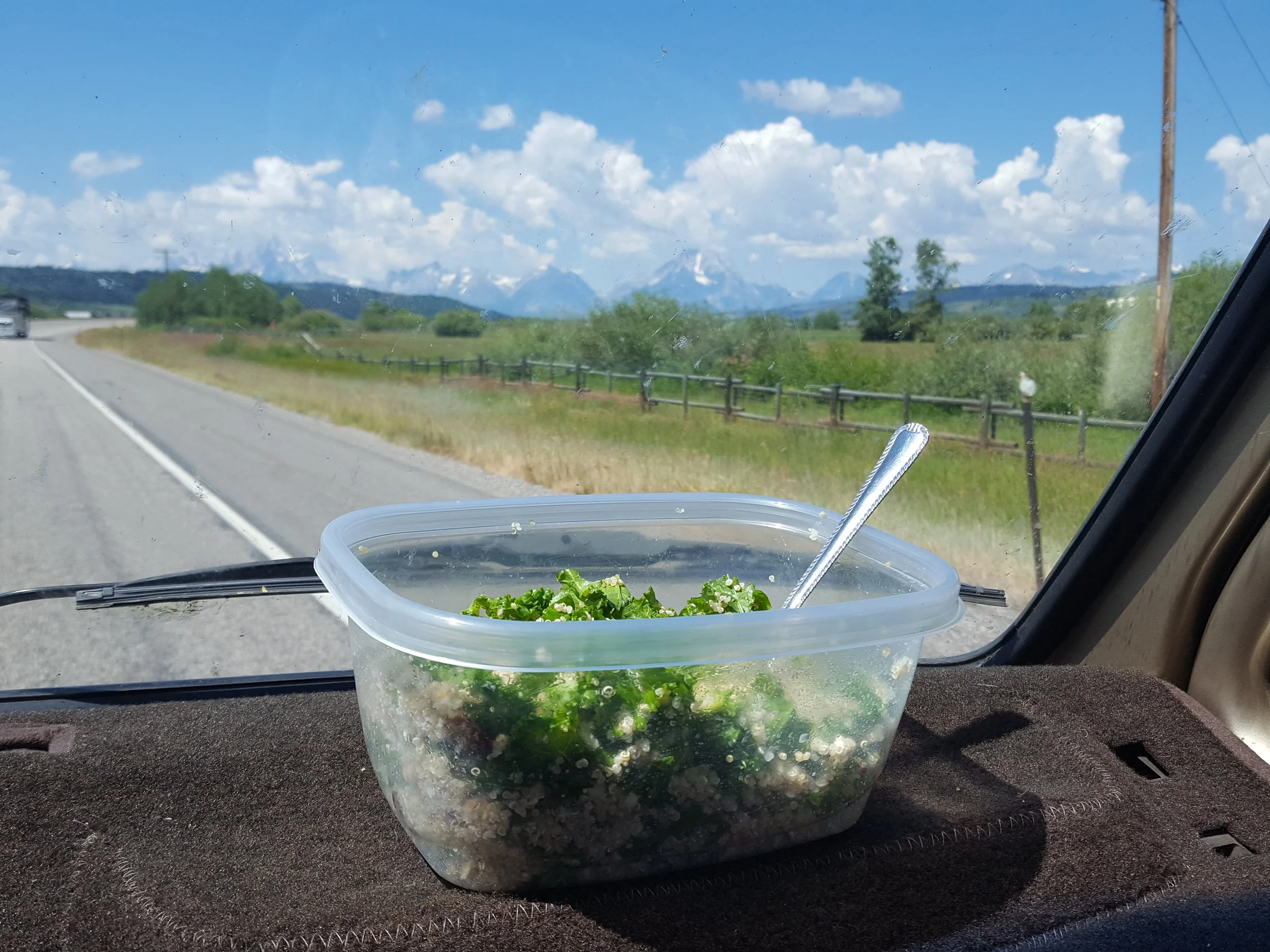 My lunch (queen-o 'n kale) with mountain views in the distance. Lest you think I've gone crunchy, dinner the previous night consisted of ramen and cheetos