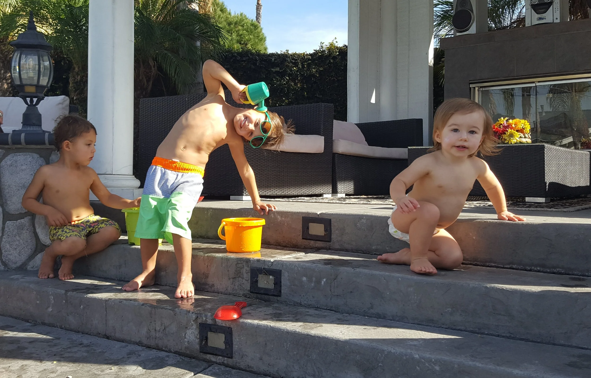 Playing with cousin, Penelope.