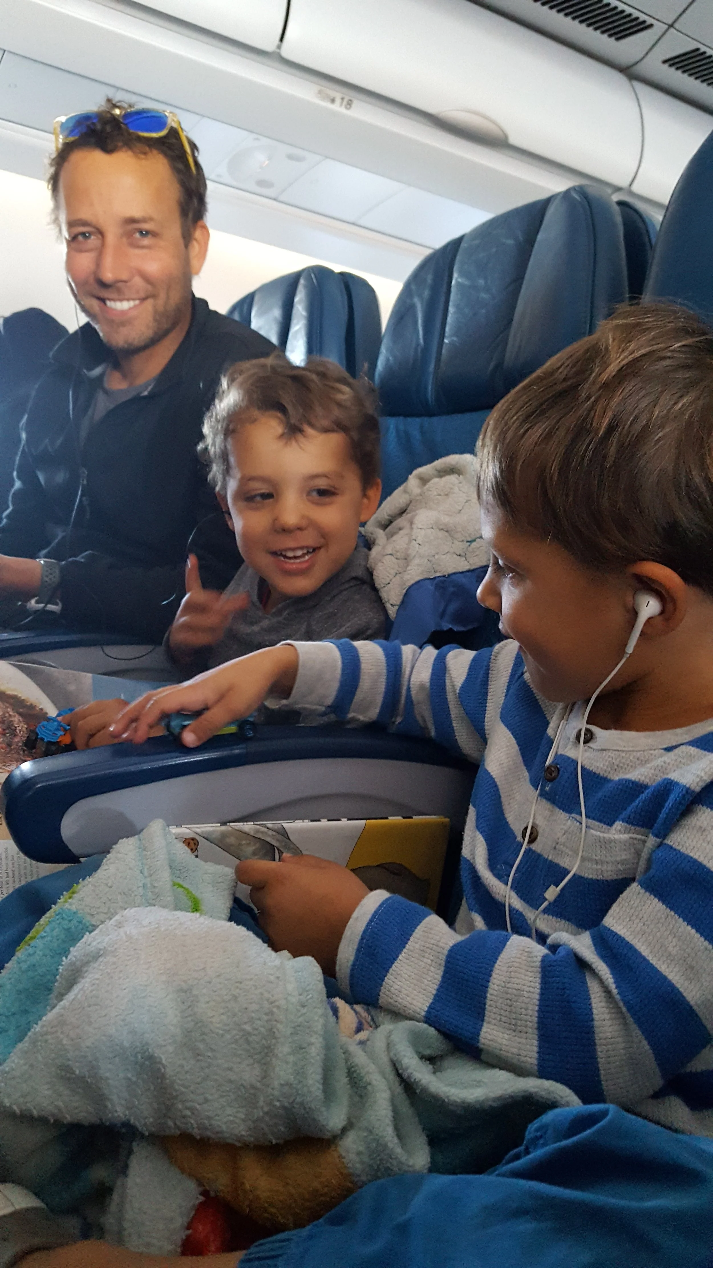 Books, cars, and headphones for listening to that god-awful airplane music = Happy Jibs