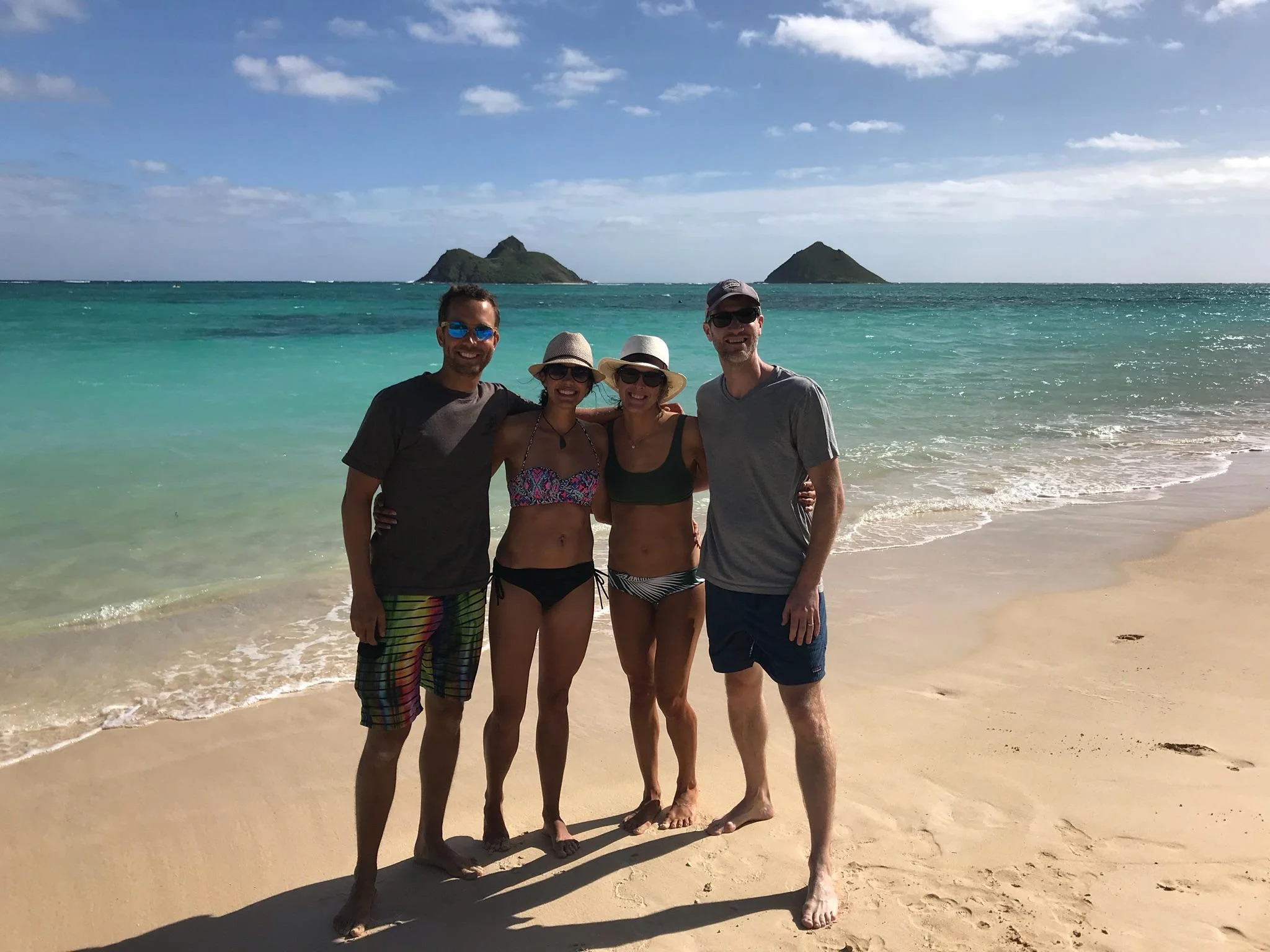 Just hanging with our best friends, the Butzens, on a stretch of beach claimed to be one of the world's best. 