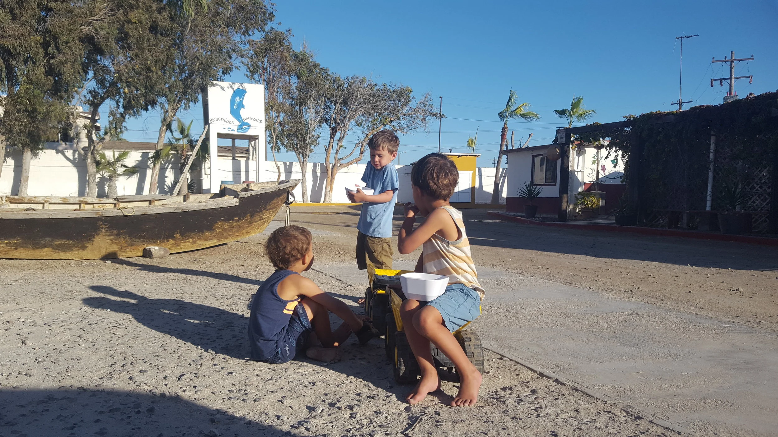 This was our Russian friend, who spoke no English, but they played an entire afternoon together pushing trucks, eating popcorn, and riding bikes: the common language of children.